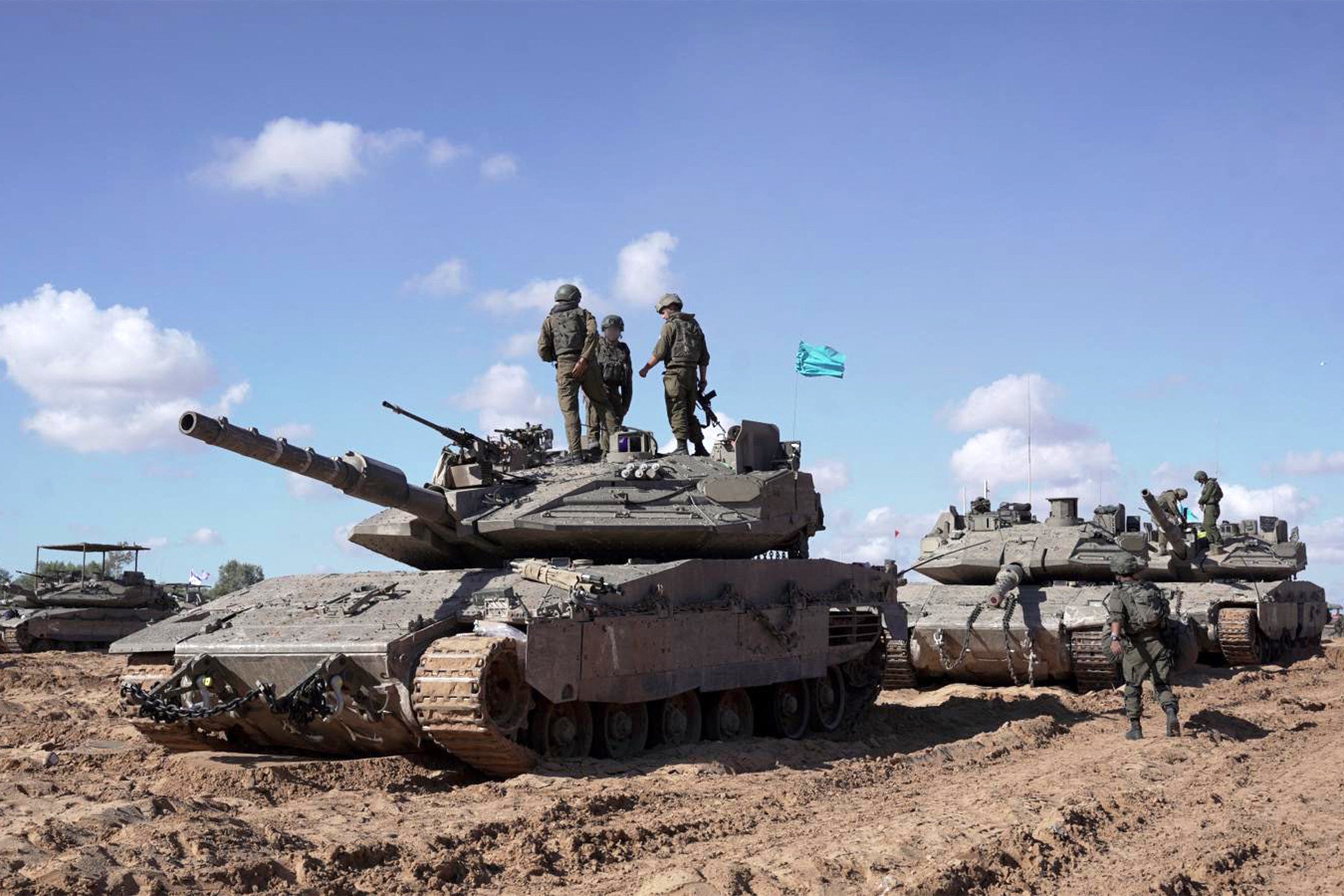 Israeli soldiers stand atop a tank in eastern Rafah in the southern Gaza Strip amid the ongoing conflict in the Palestinian territory between Israel and Hamas. Photo: Israeli Army/AFP