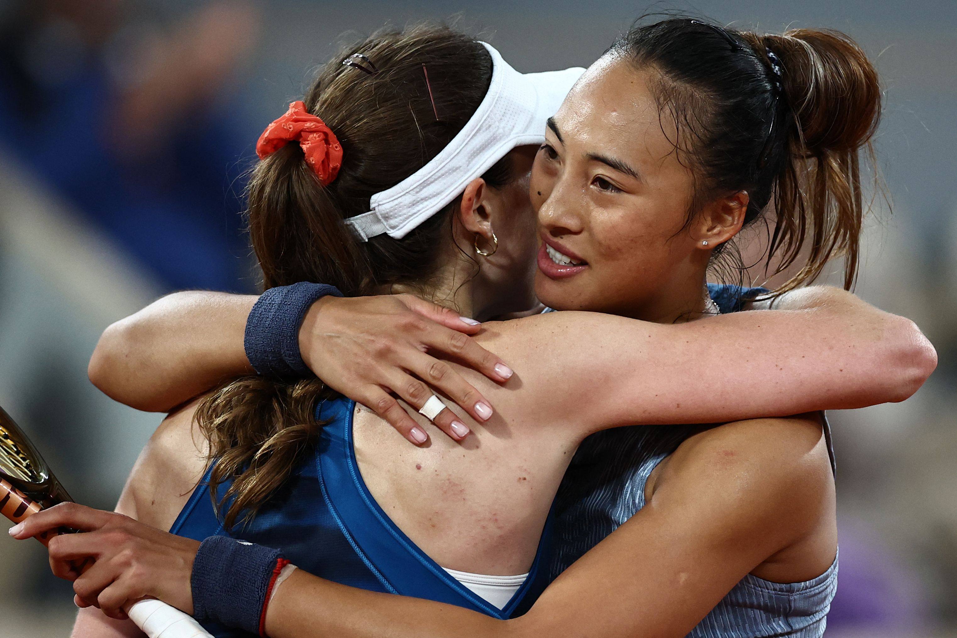China’s Zheng Qinwen (right) embraces France’s Alize Cornet after winning their women’s singles match at the French Open. Photo: AFP