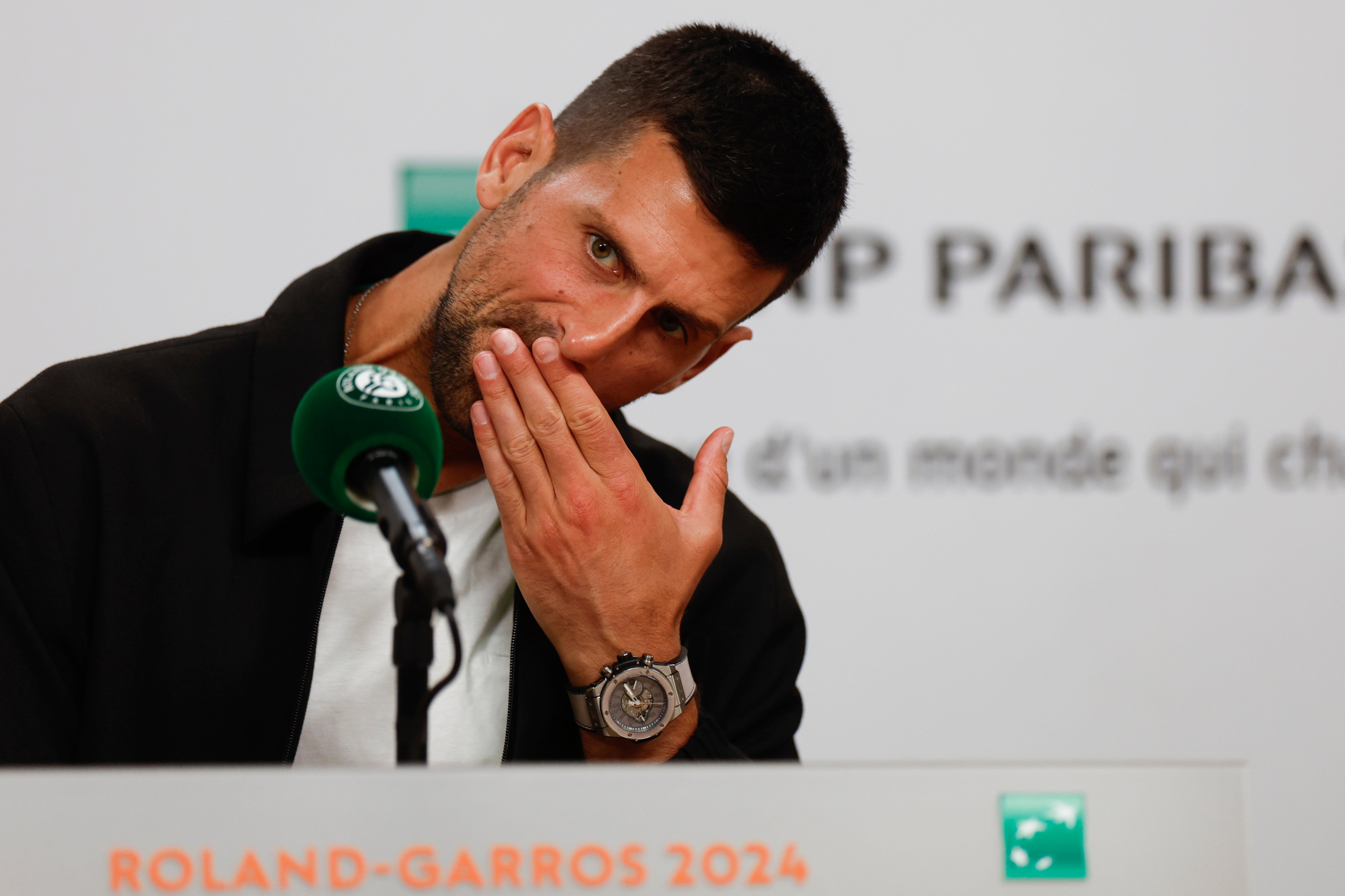 Serbia’s Novak Djokovic, seen here pondering a question at a press conference, says “I know exactly what I need to do in a grand slam environment”. Photo: AP
