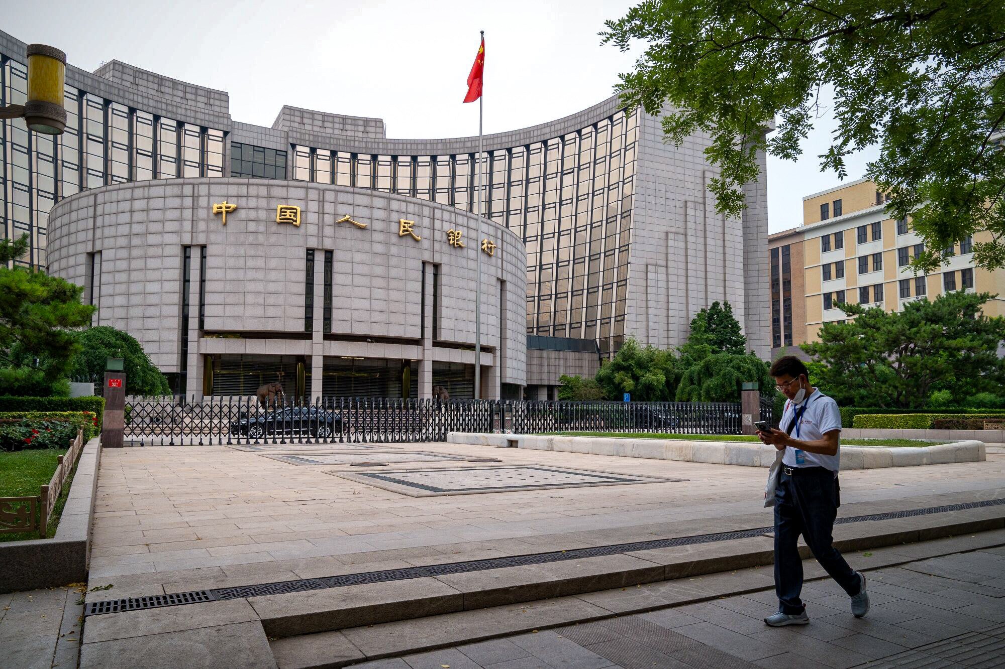 With low inflation rates in China, there have been expectations from investors that the PBOC may cut interest rates to boost weak credit demand. Photo: Bloomberg