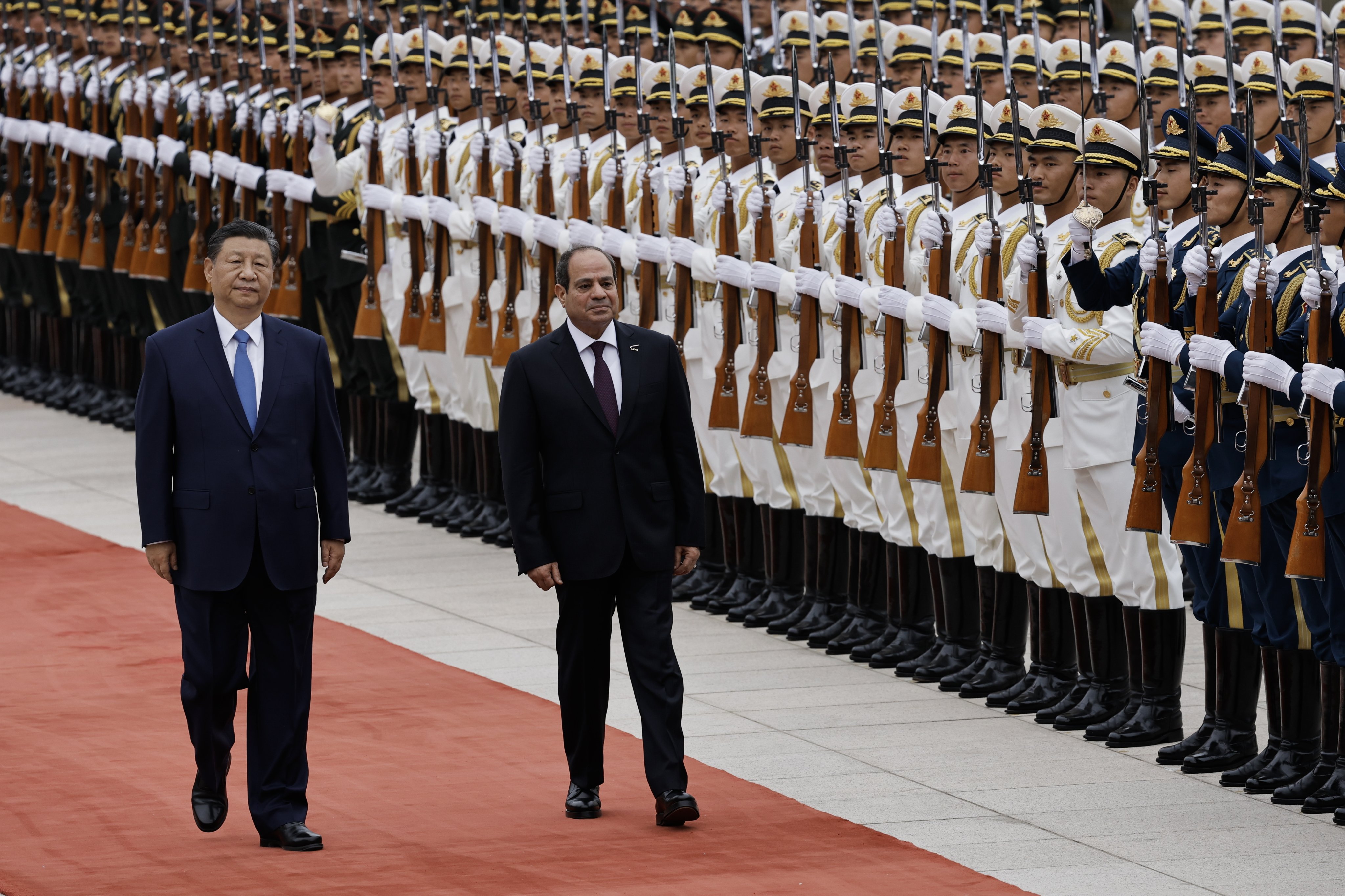 Chinese President Xi Jinping and his Egyptian counterpart Abdel Fattah el-Sisi review an honour guard at the Great Hall of the People, in Beijing on Wednesday. Photo: EPA-EFE 