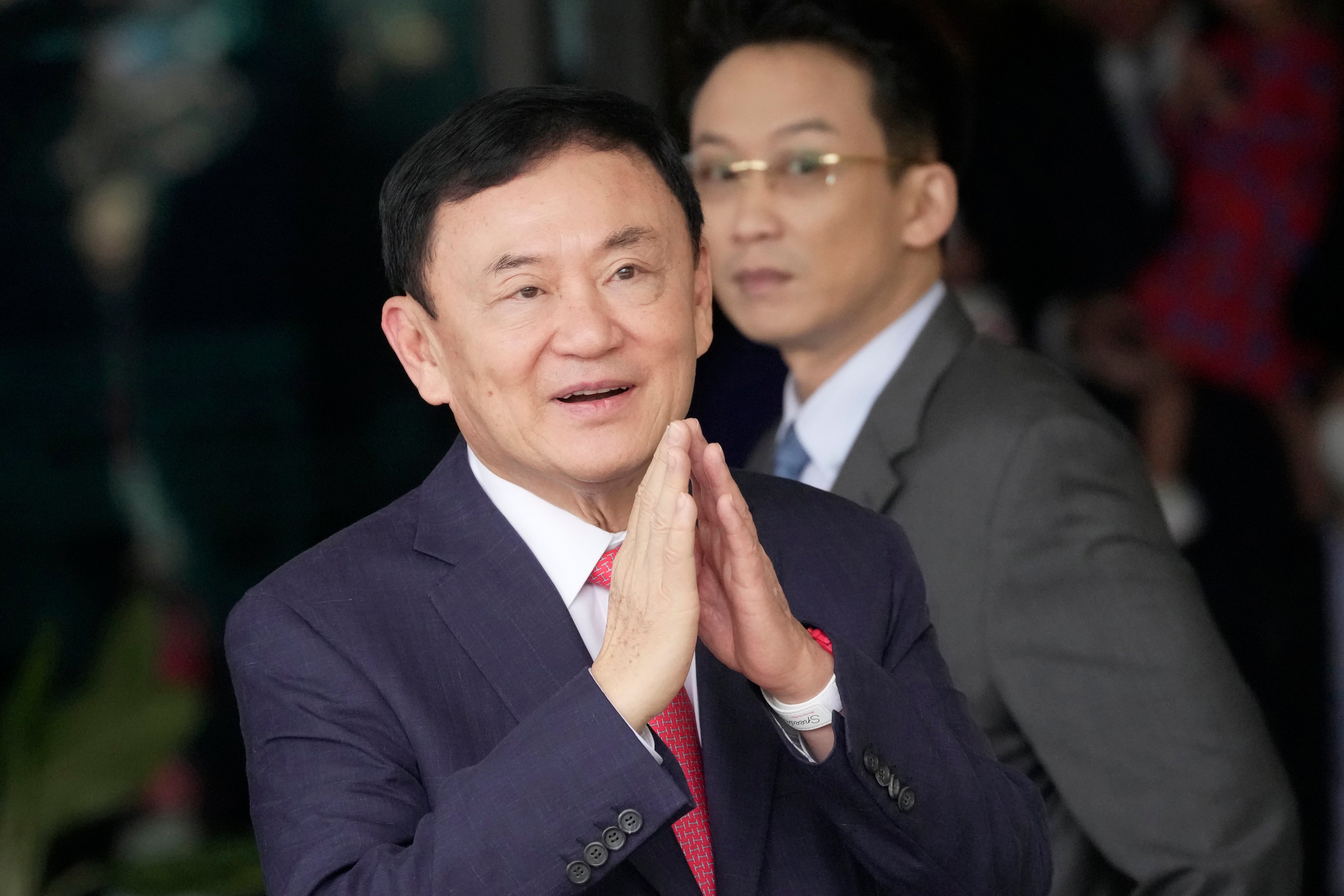 Thailand’s former Prime Minister Thaksin Shinawatra at Don Muang airport in Bangkok, Thailand. Photo: AP