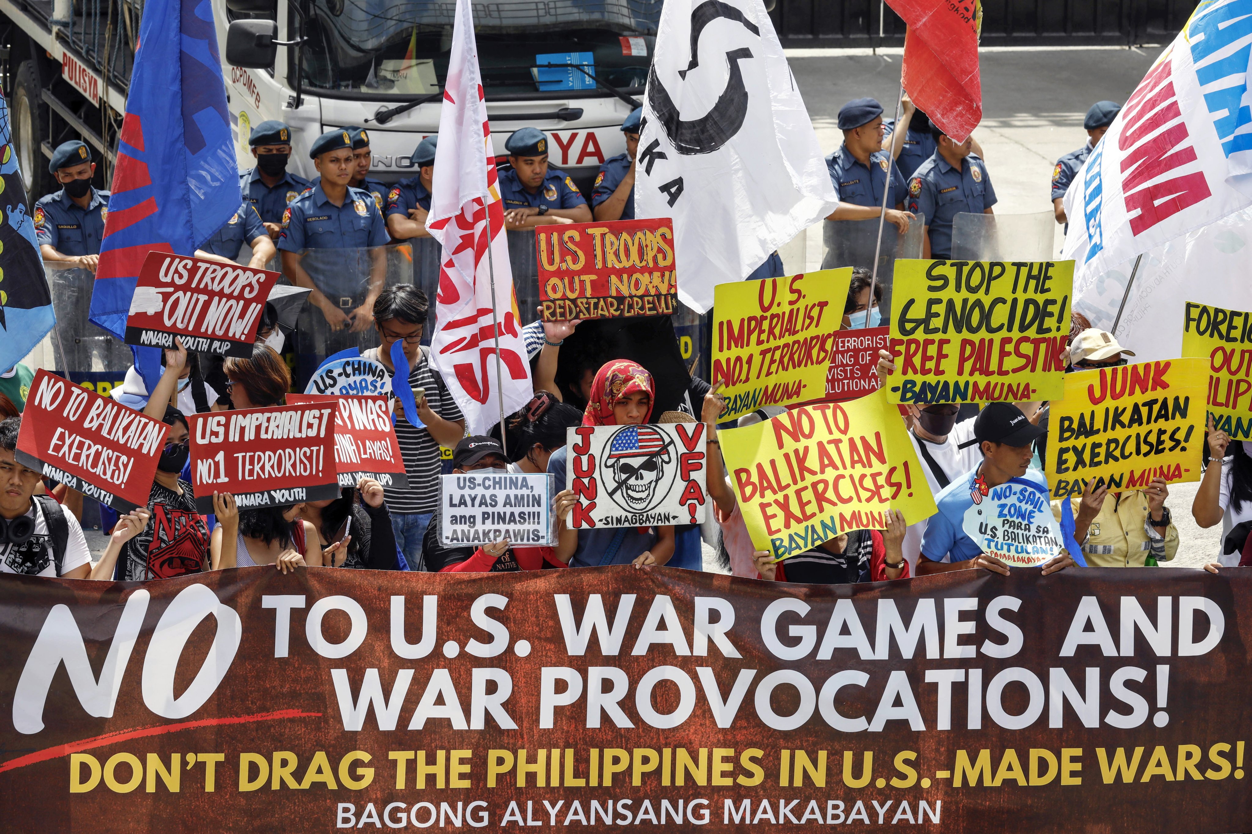 Protesters opposed to US-Philippines military exercises hold a rally outside the headquarters of the Armed Forces of the Philippines in Quezon City on May 10. Photo: EPA-EFE