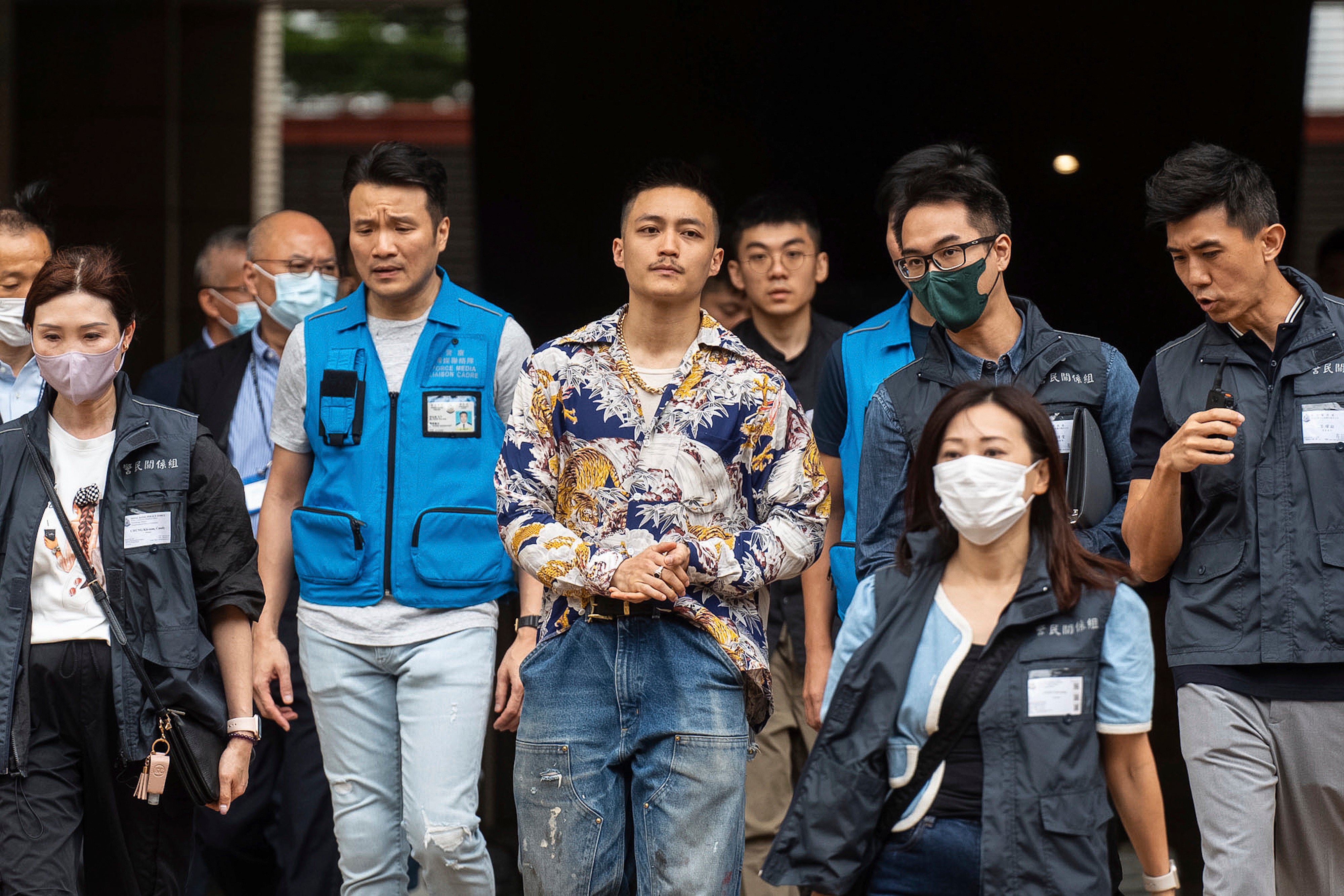 Lee Yue-shun, a former district councillor, leaves the West Kowloon Magistrates’ Courts after being acquitted of subversion on May 30. Photo: AP 