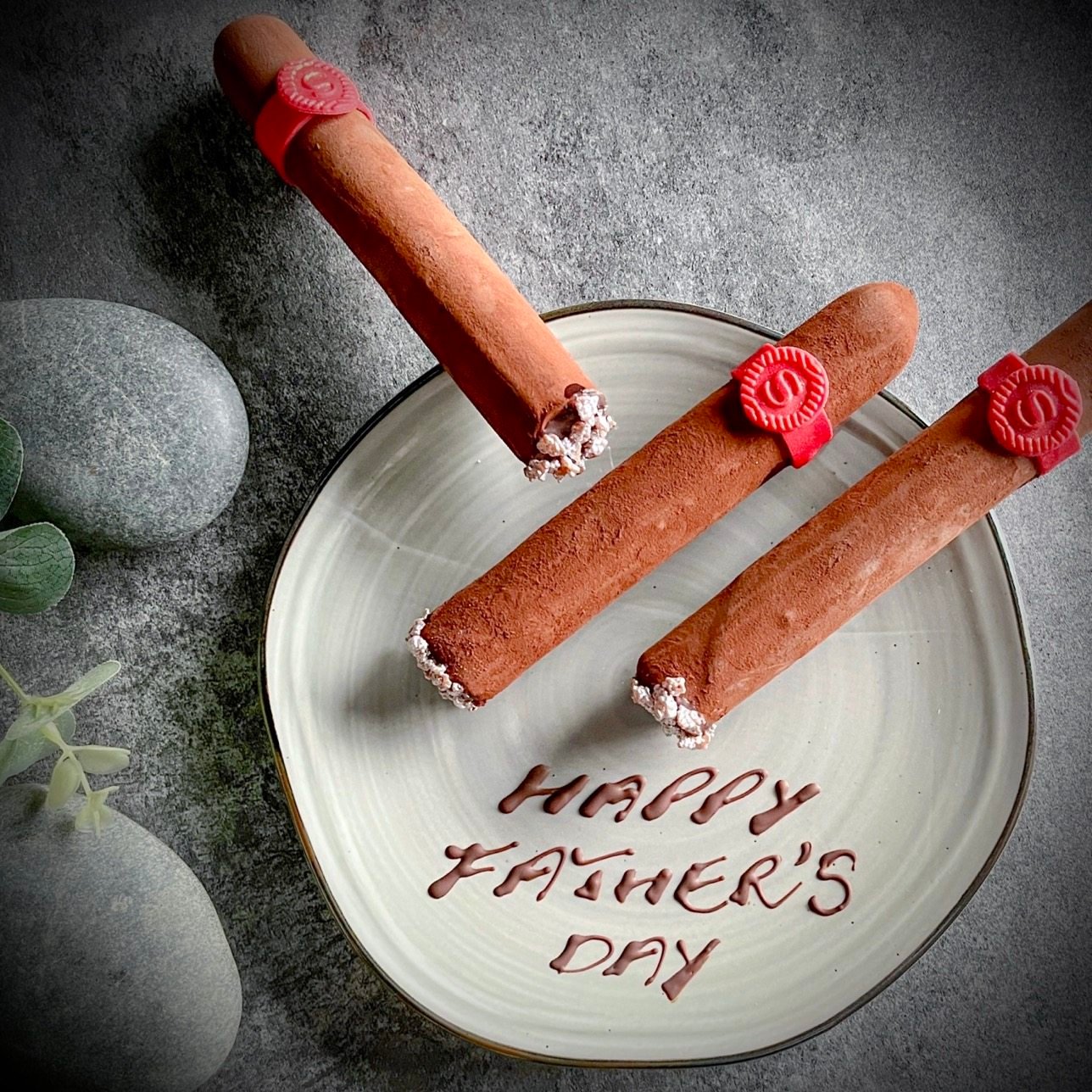 A hazelnut chocolate cigar serves as dessert at the Oyster & Wine Bar this Father’s Day. Photo: Oyster & Wine Bar