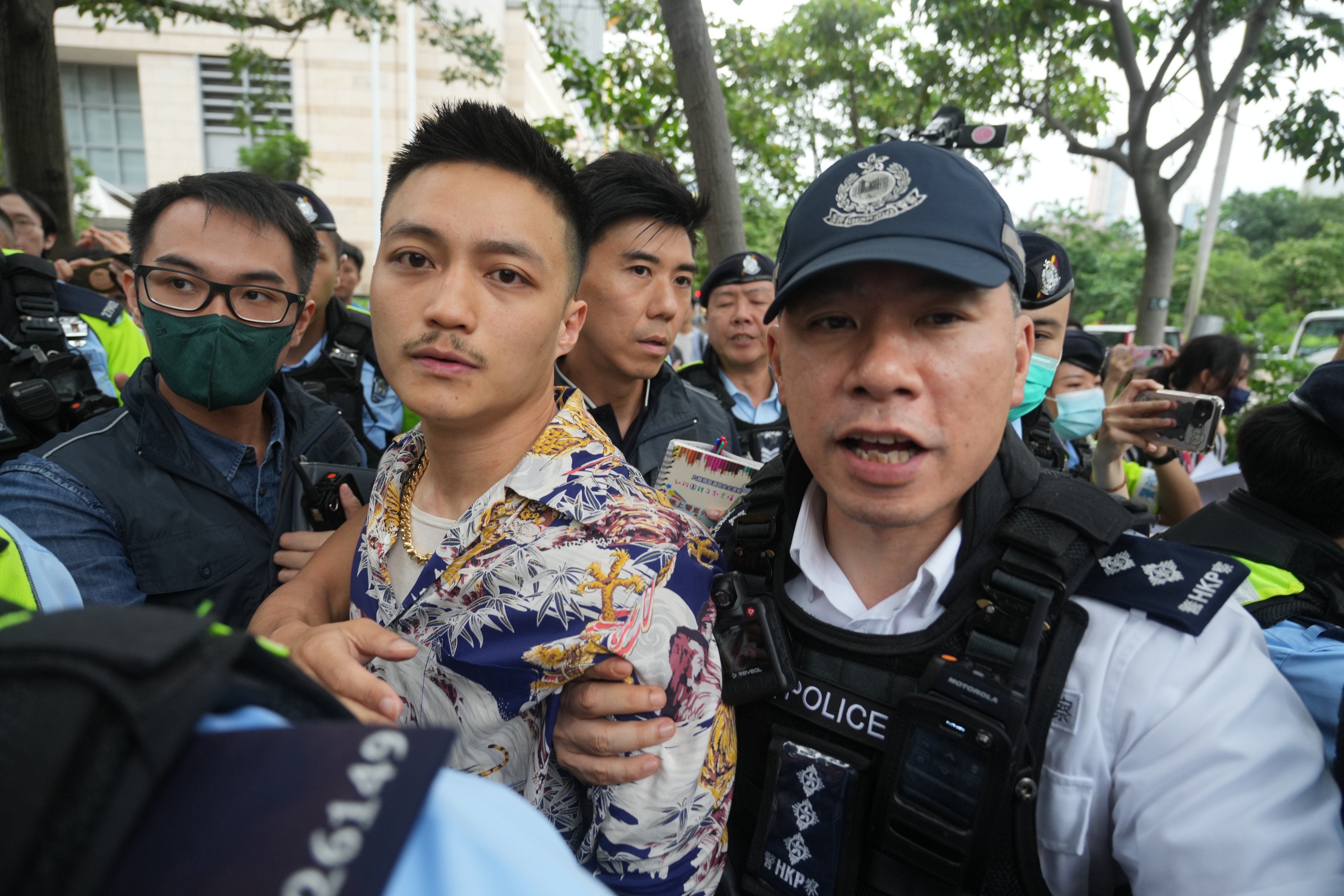 Lee Yue-shun, one of the 16 opposition members whose verdict was heard on Thursday, leaves West Kowloon Court. Photo: Sam Tsang