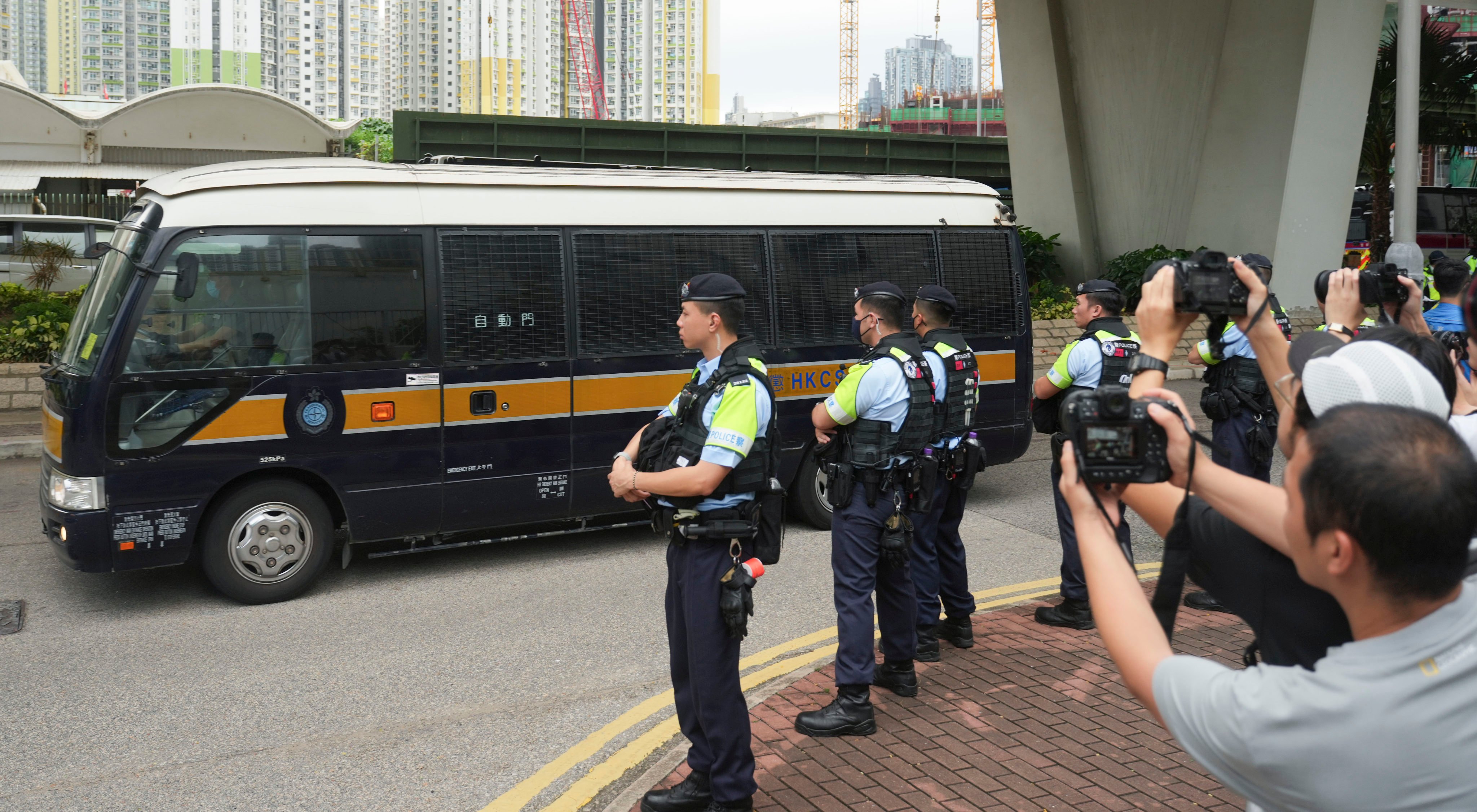 Defendants leave West Kowloon Court in a prison vehicle on Thursday after the verdicts were delivered. Photo: Sam Tsang