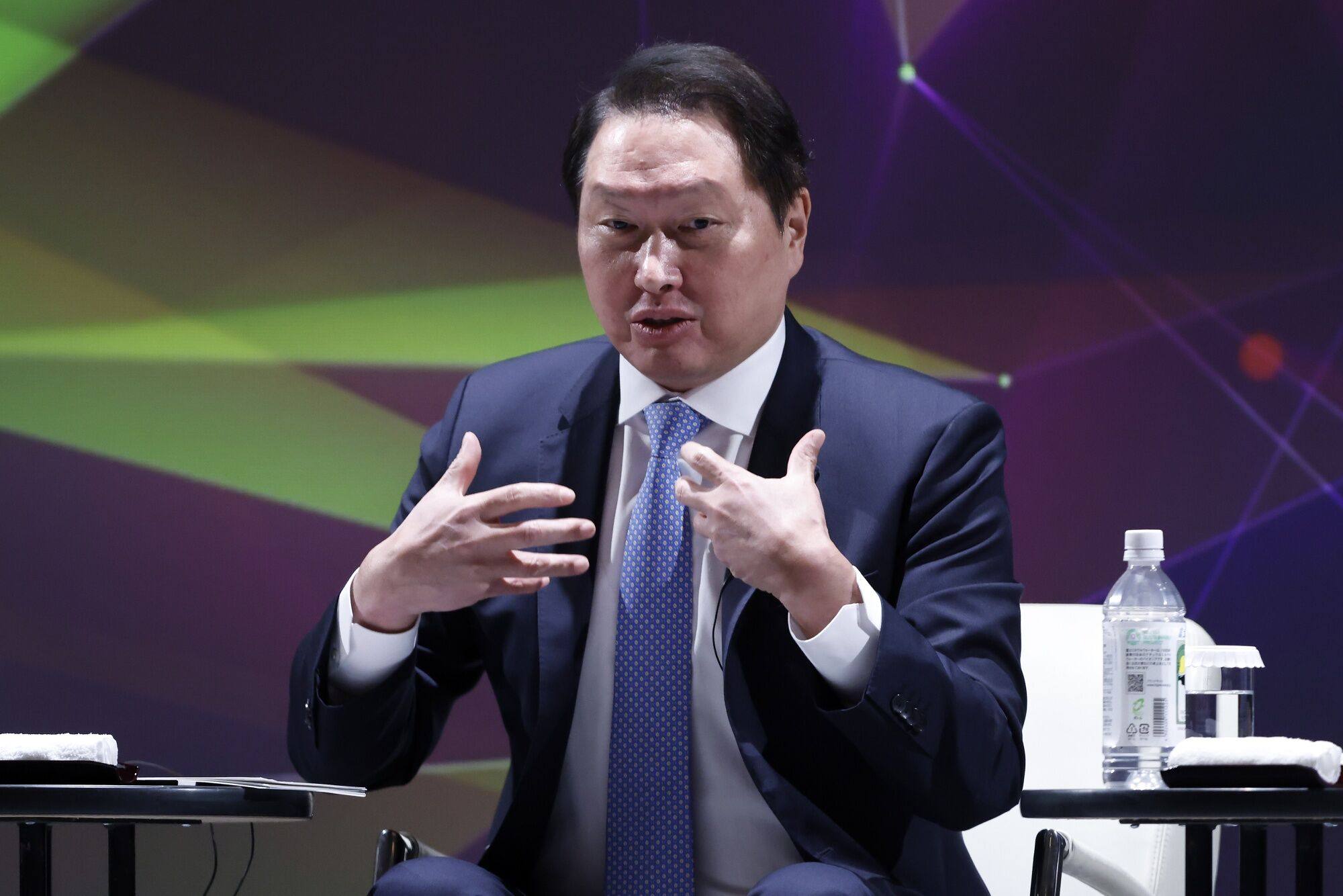 SK Group Chairman Chey Tae-won speaks during the Nikkei Forum in Tokyo on May 23. Photo: Bloomberg