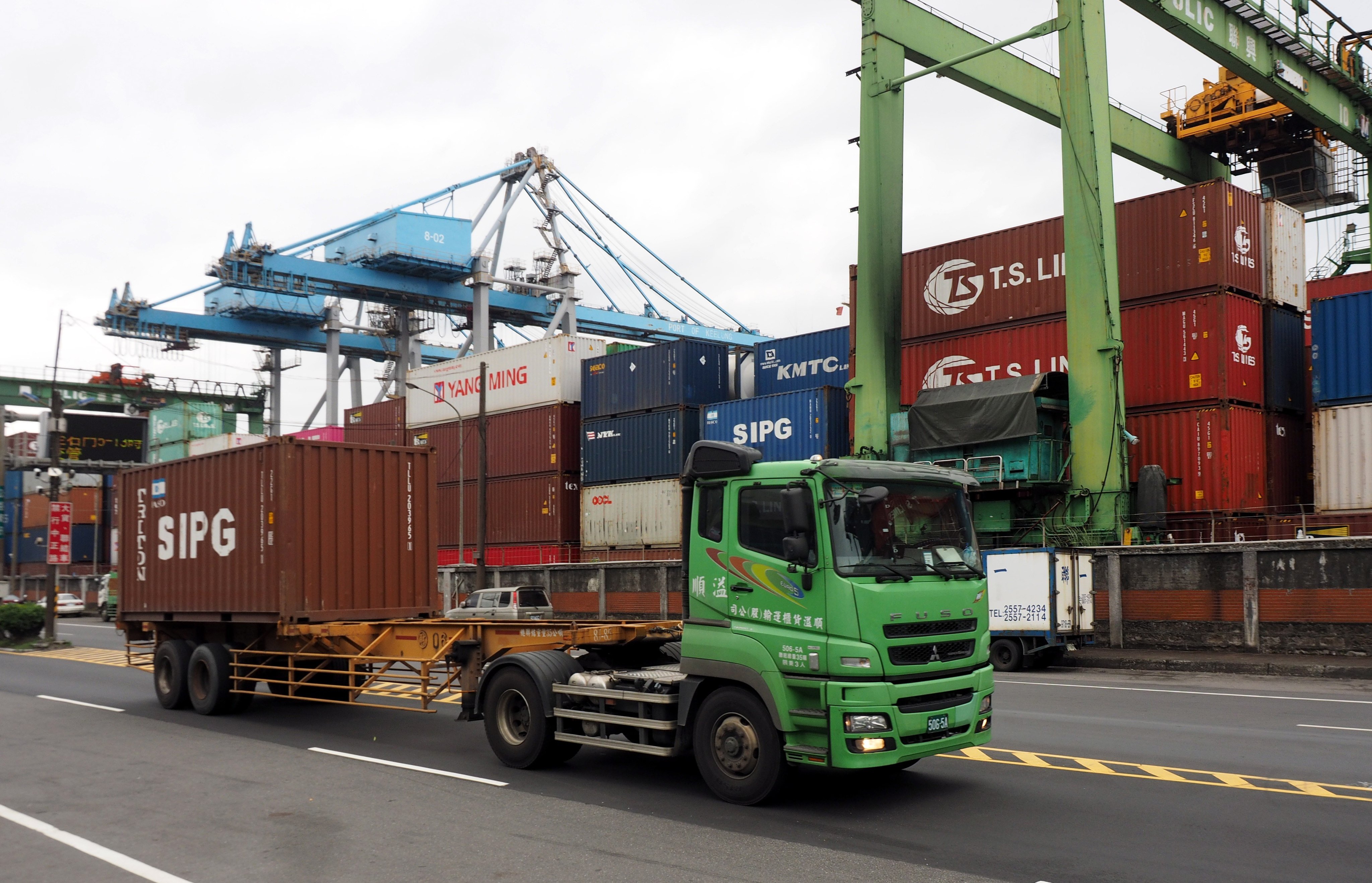 A truck drives through the Keelung Harbour in Keelung City, Taiwan. Photo: EPA-EFE