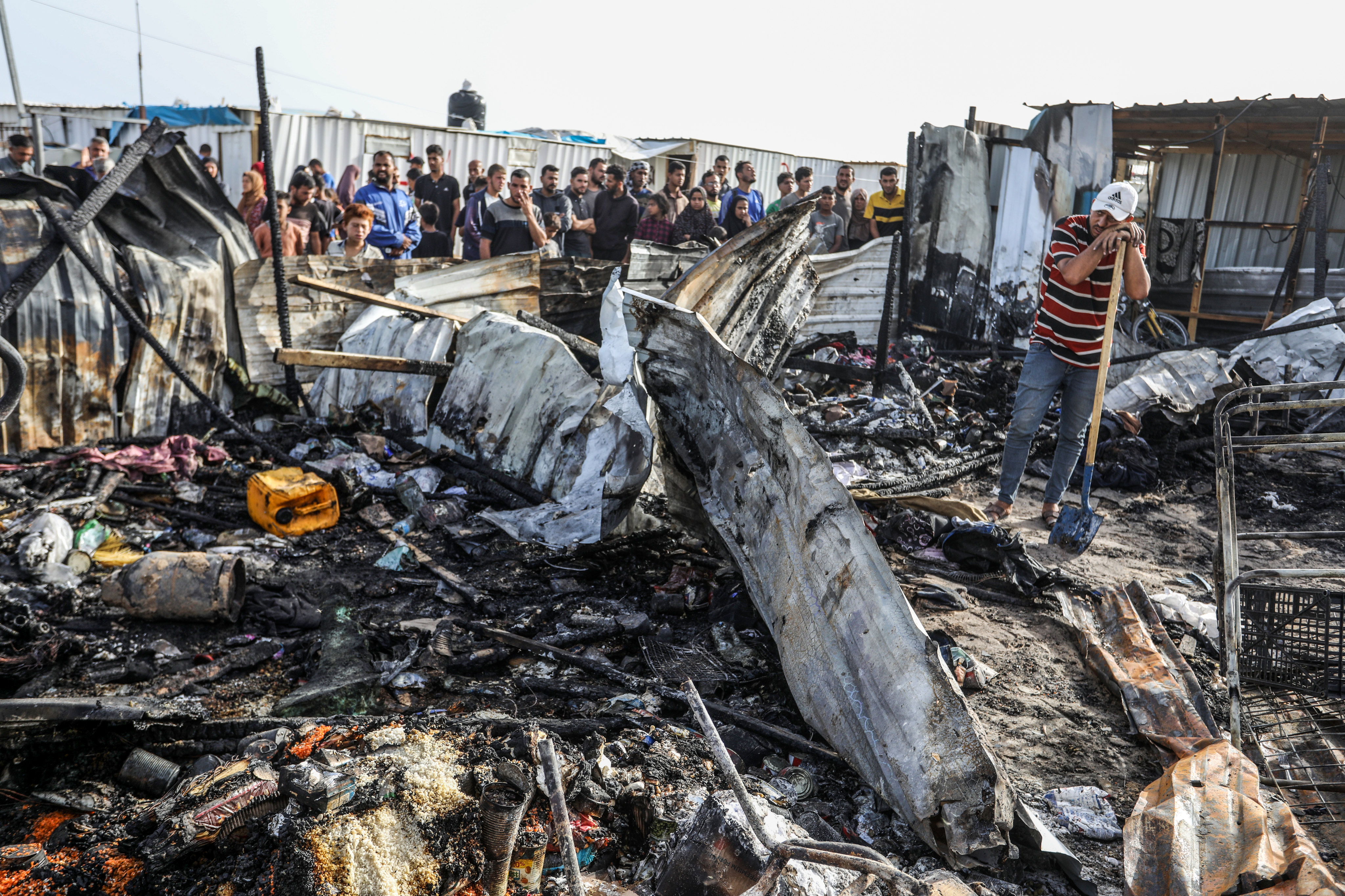 The aftermath of an Israeli air strike that killed dozens at a tent camp near the southern Gaza city of Rafah on Sunday. Photo: dpa