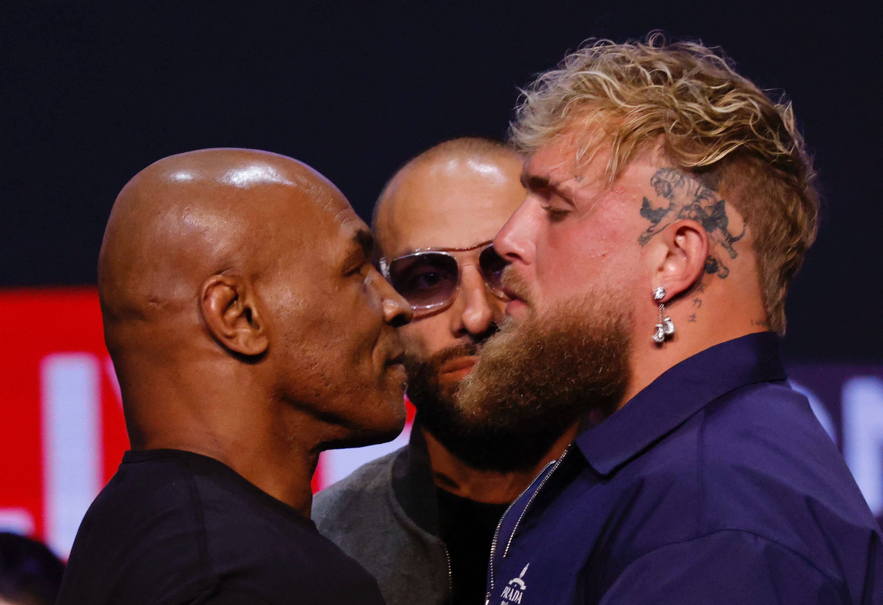 Mike Tyson (left and YouTuber Jake Paul face off during a press conference at the Apollo Theatre in New York, on May 13, 2024. Photo: AFP