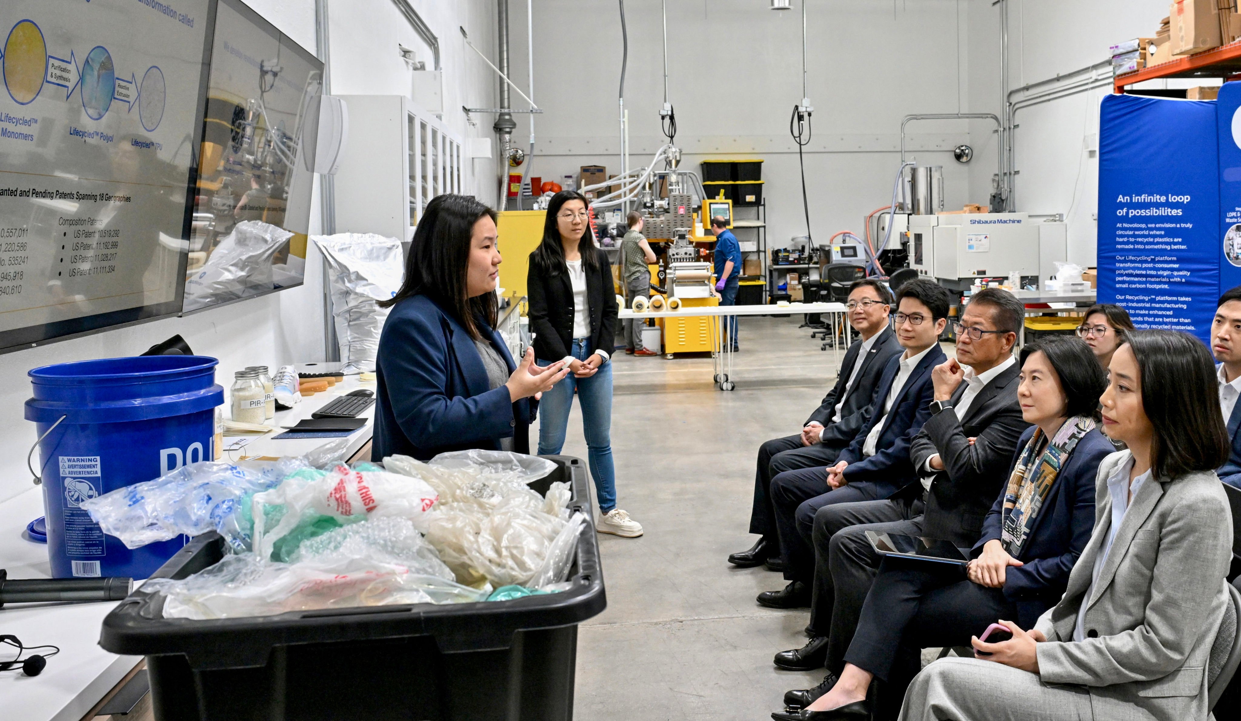 Financial Secretary Paul Chan (third right) and InvestHK’s Director General Alpha Lau (second right) visit a technology company engaged in plastic materials recycling in San Francisco. Photo: SCMP