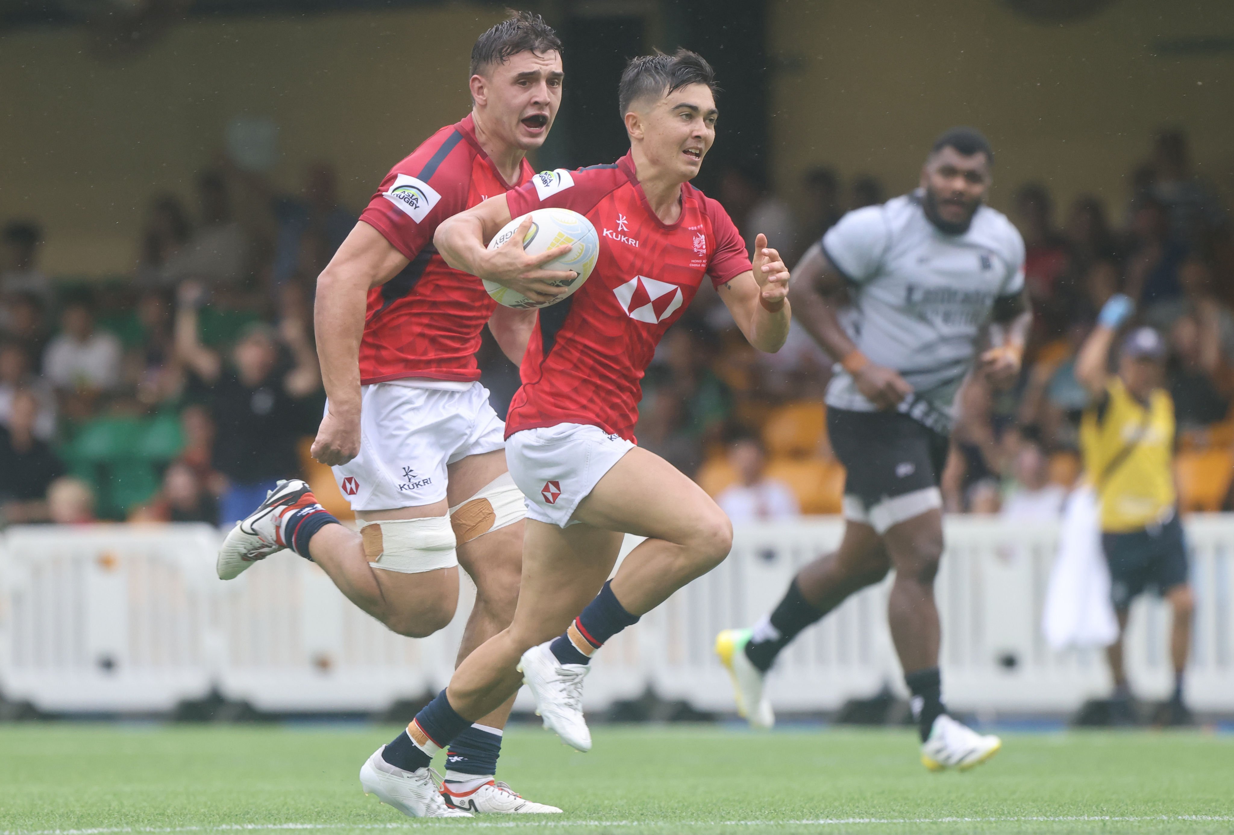 Hong Kong’s Harry Laidler sprints free to score one of his side’s eight tries in their Asia Rugby Championship win over the UAE. Photo: Jonathan Wong