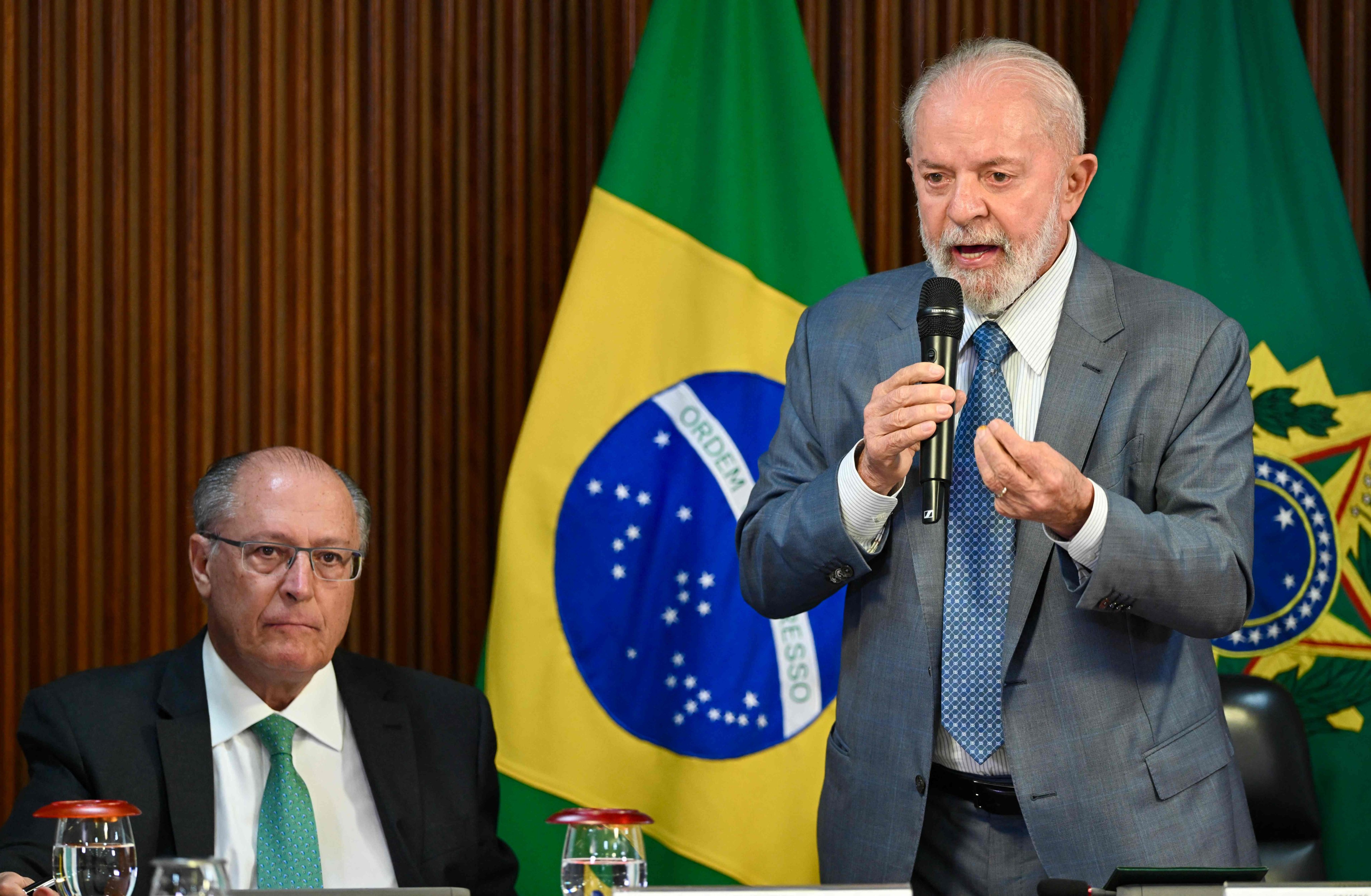 Brazilian President Luiz Inacio Lula da Silva (right) speaks as Vice-President and Minister of Industry and Trade Geraldo Alckmin looks on at the Planalto Palace in Brasilia on May 13, 2024. Photo: AFP