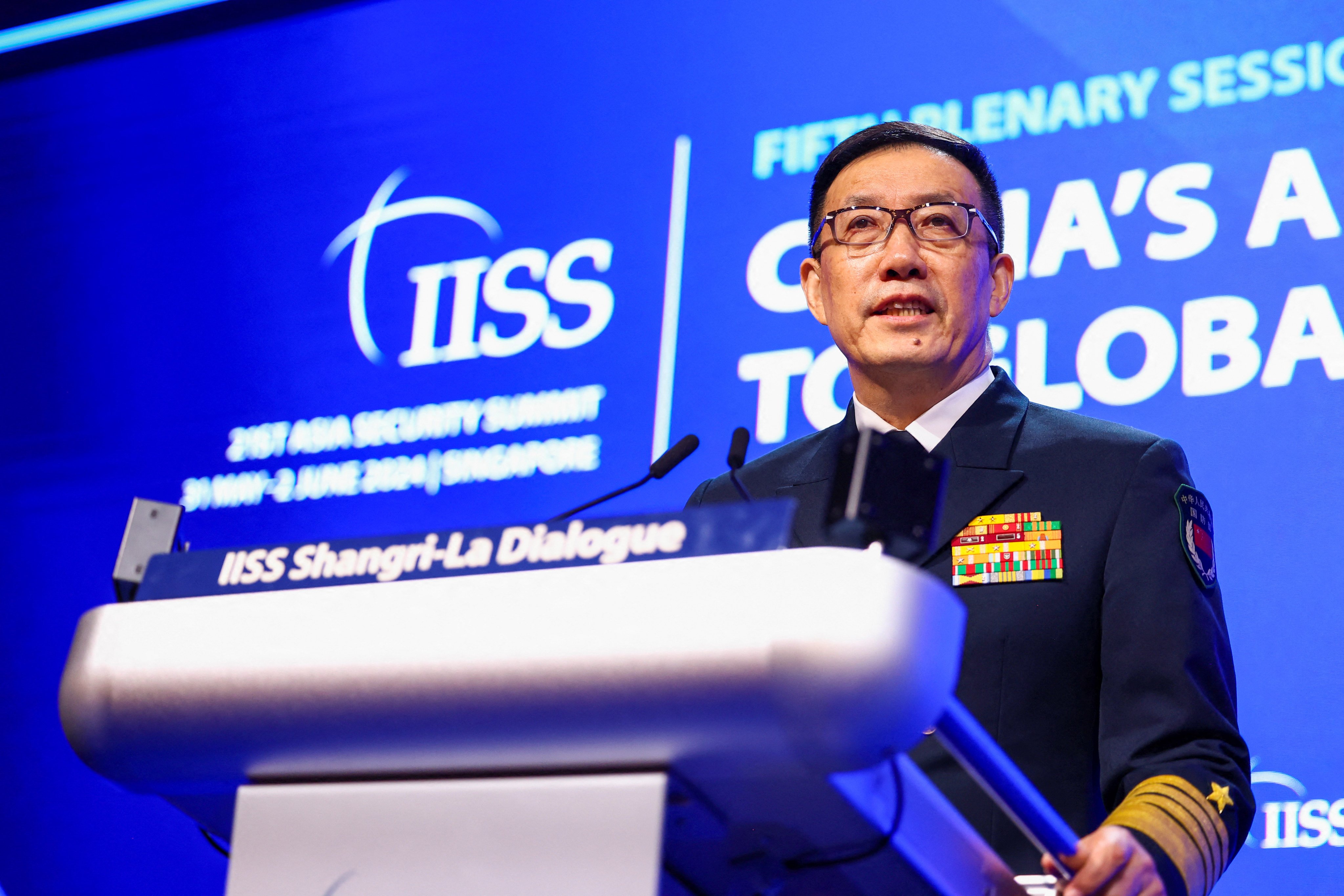 Chinese Defense Minister Dong Jun addresses the Shangri-La Dialogue in Singapore on Sunday. Photo: Reuters