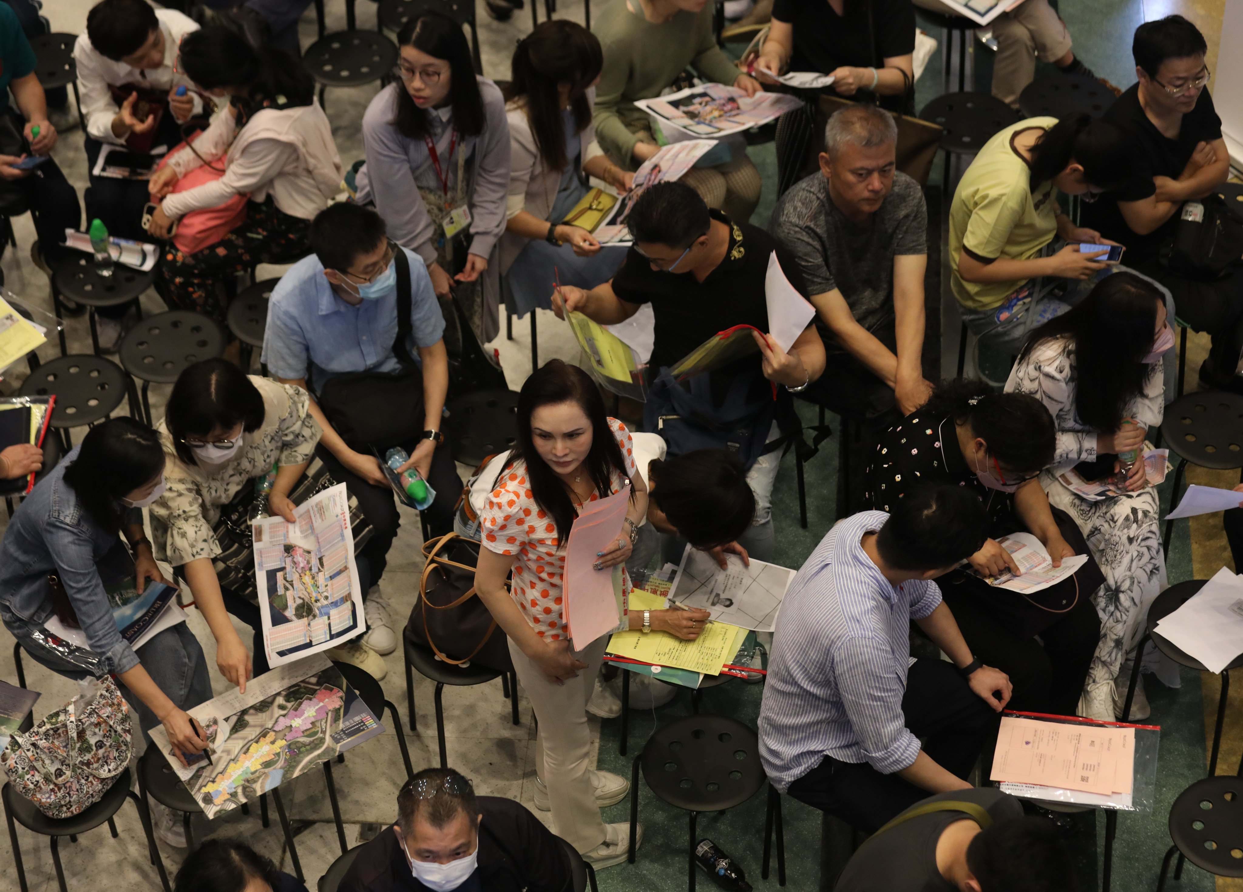 Potential homebuyers gather at Fortune Metropolis for a new batch of 138 units at Blue Coast by CK Asset on April 13, 2024. Photo: Xiaomei Chen