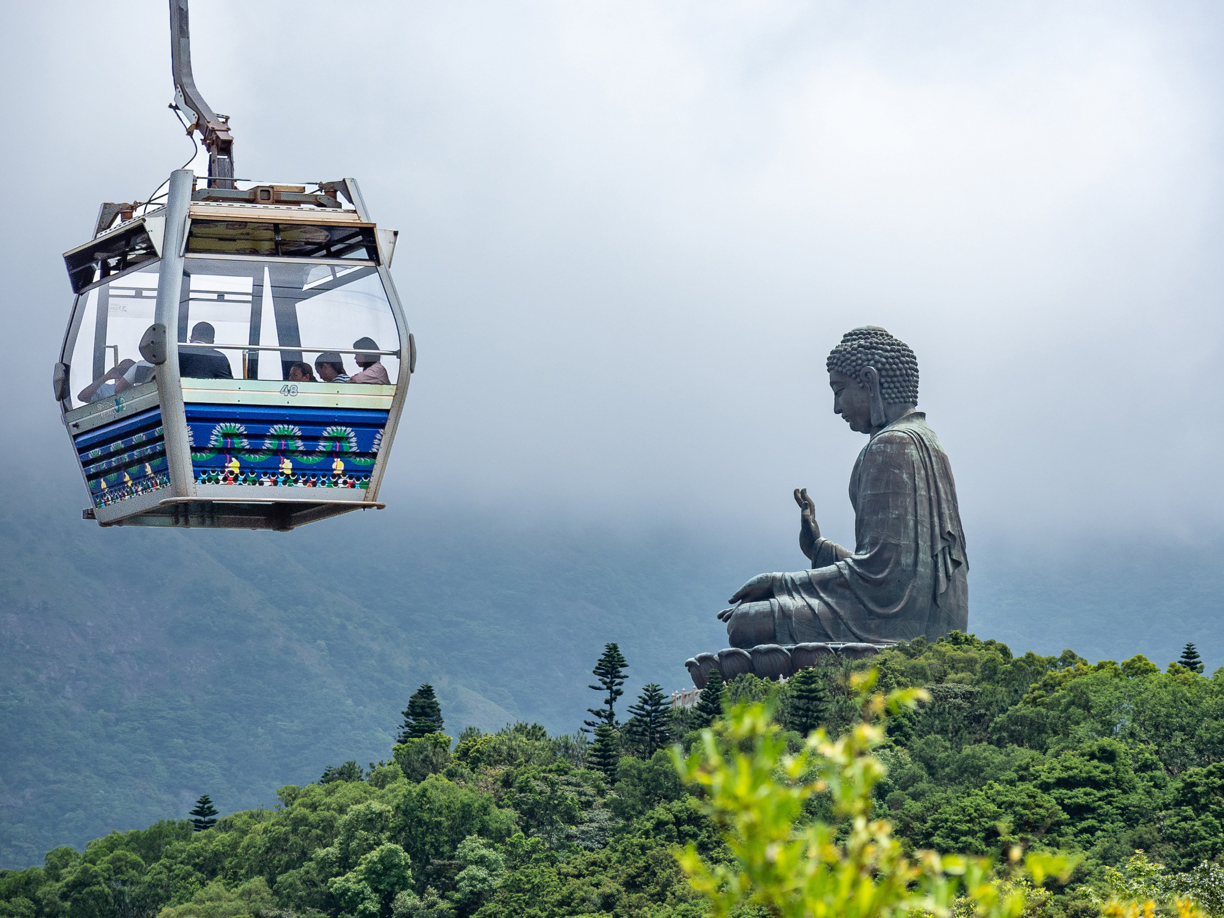 A Ngong Ping 360 cable car approaches the site of the city’s famous “Big Buddha” statue. Photo: Shutterstock