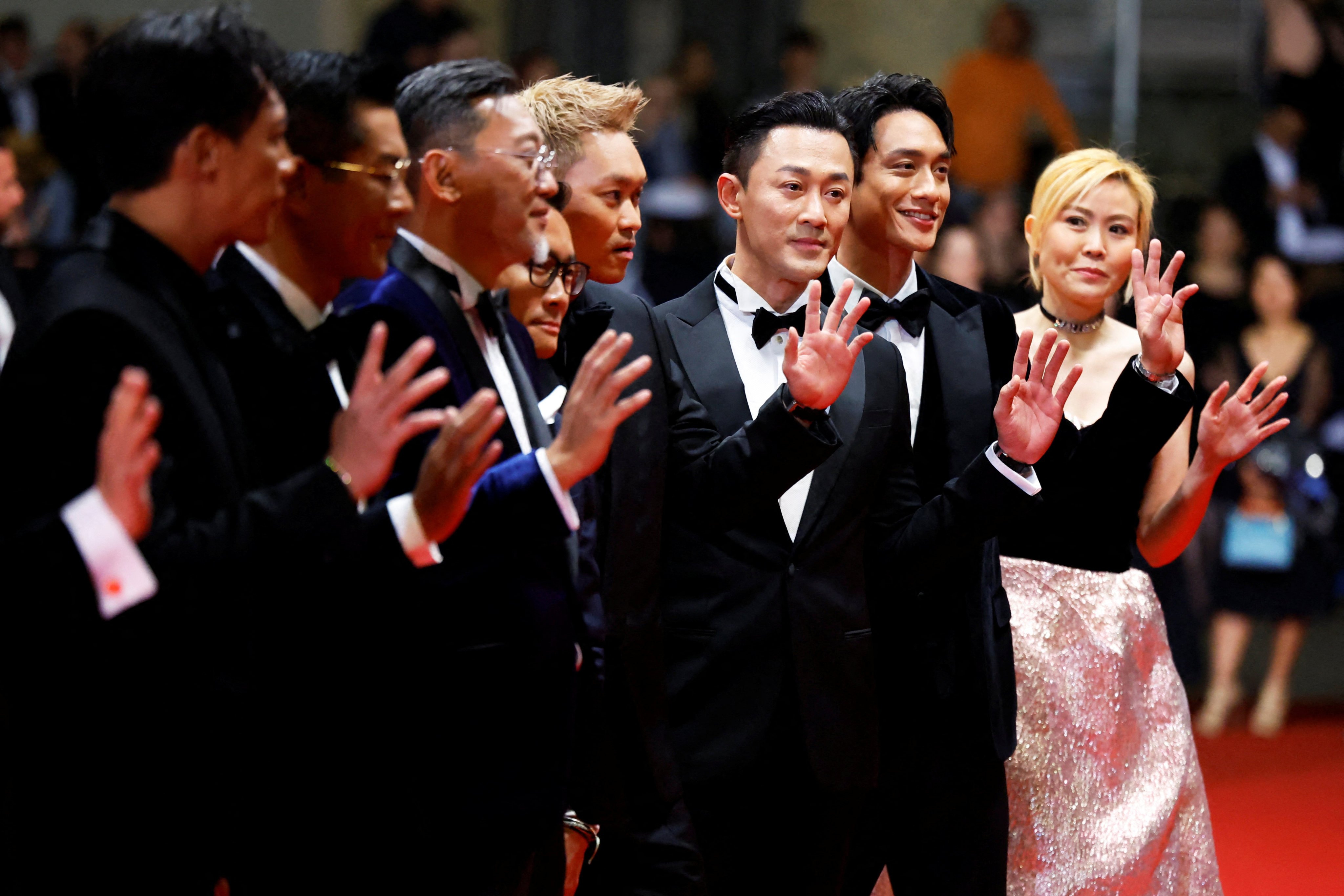 Director Soi Cheang and cast members of the film “Twilight of the Warriors: Walled In” pose on the red carpet as they arrive for the screening of the film at  Cannes Film Festival in Cannes, France, on May 16. Photo: Reuters 