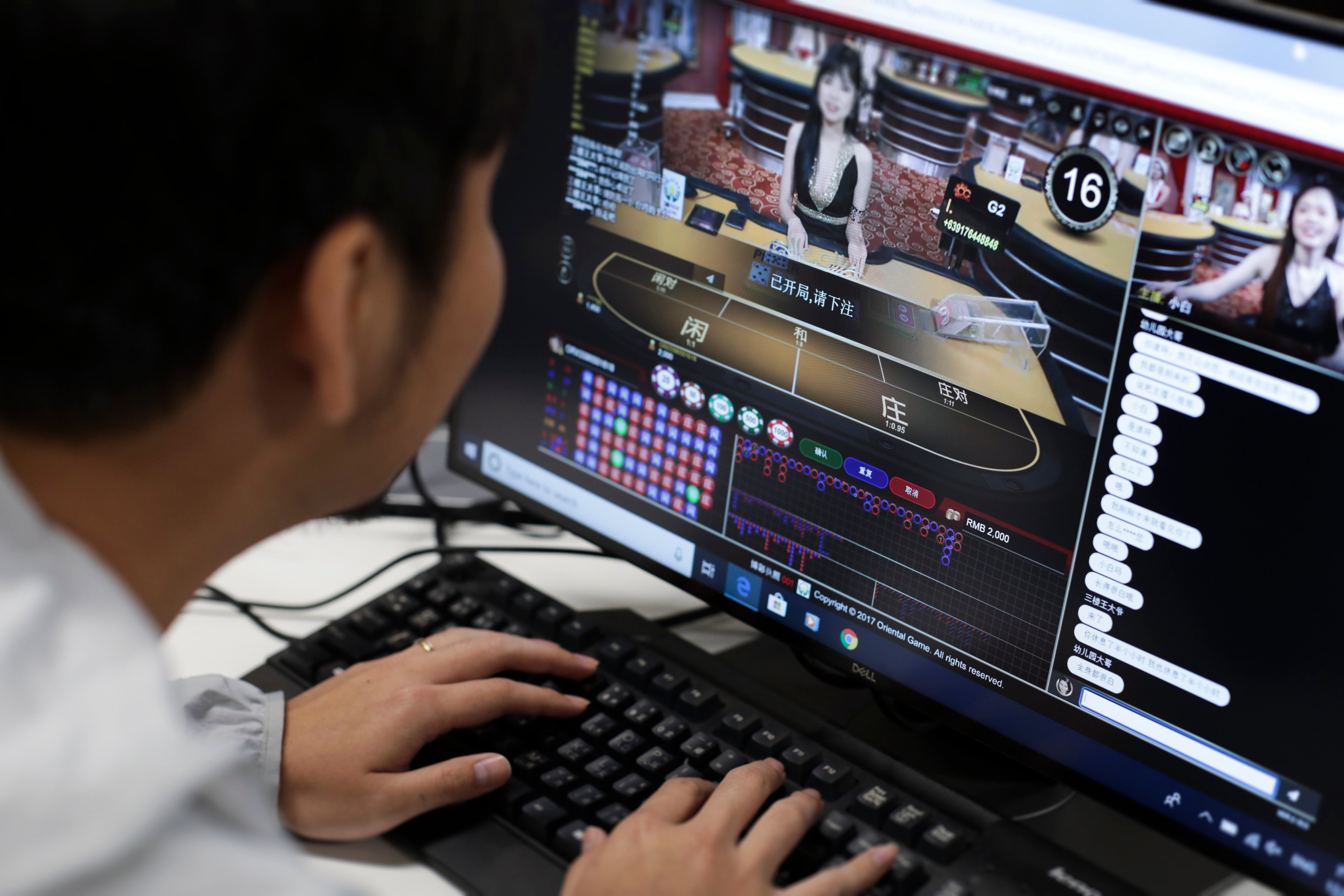 A screen shows a Philippine Offshore Gaming Operator’s website catering to Chinese gamblers. Photo: Tory Ho