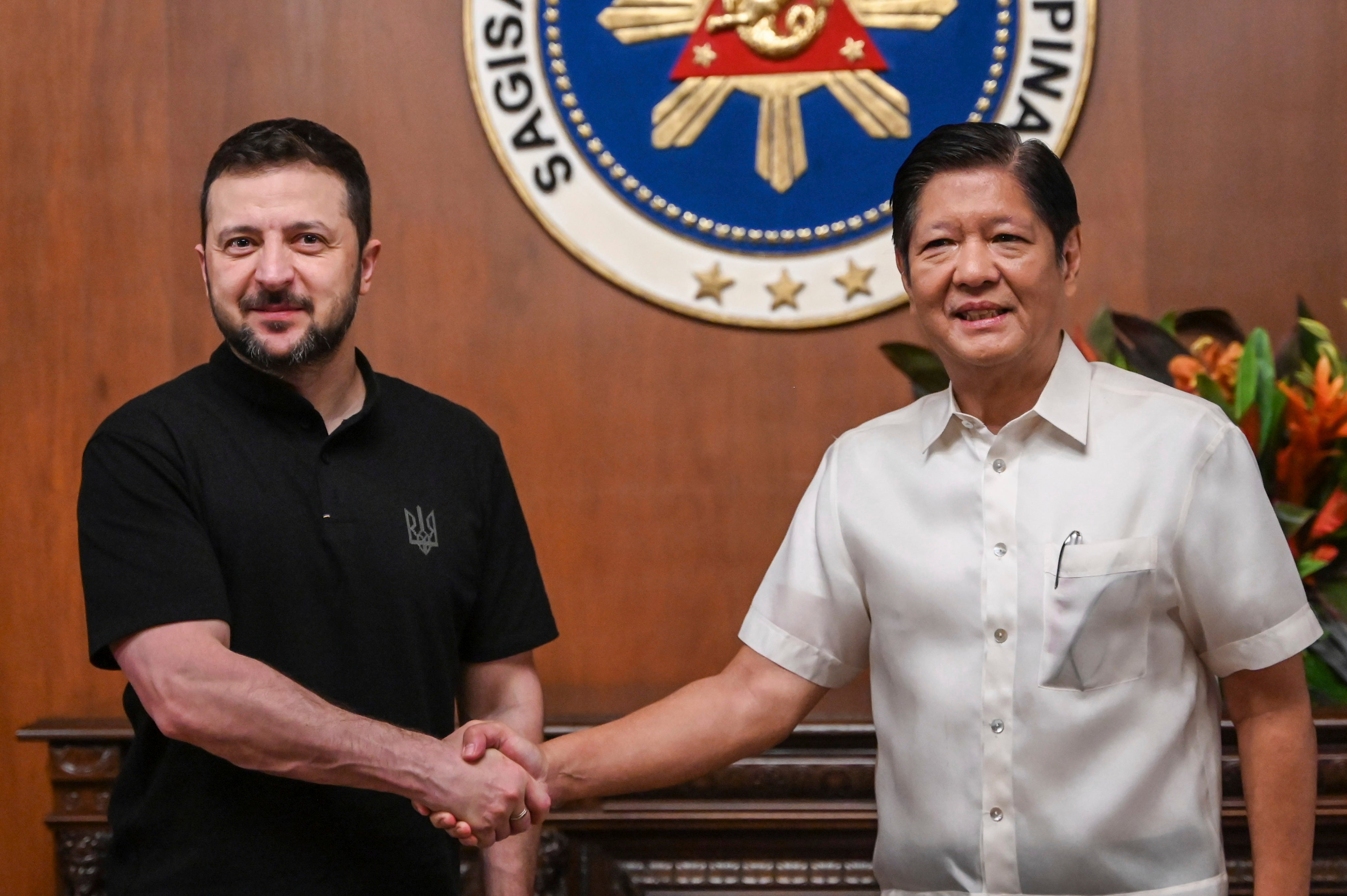 Ukraine’s President Volodymyr Zelensky (left) meets Philippine President Ferdinand Marcos Jnr at the Malacanang presidential palace in Manila on Monday. Photo: Pool via AP