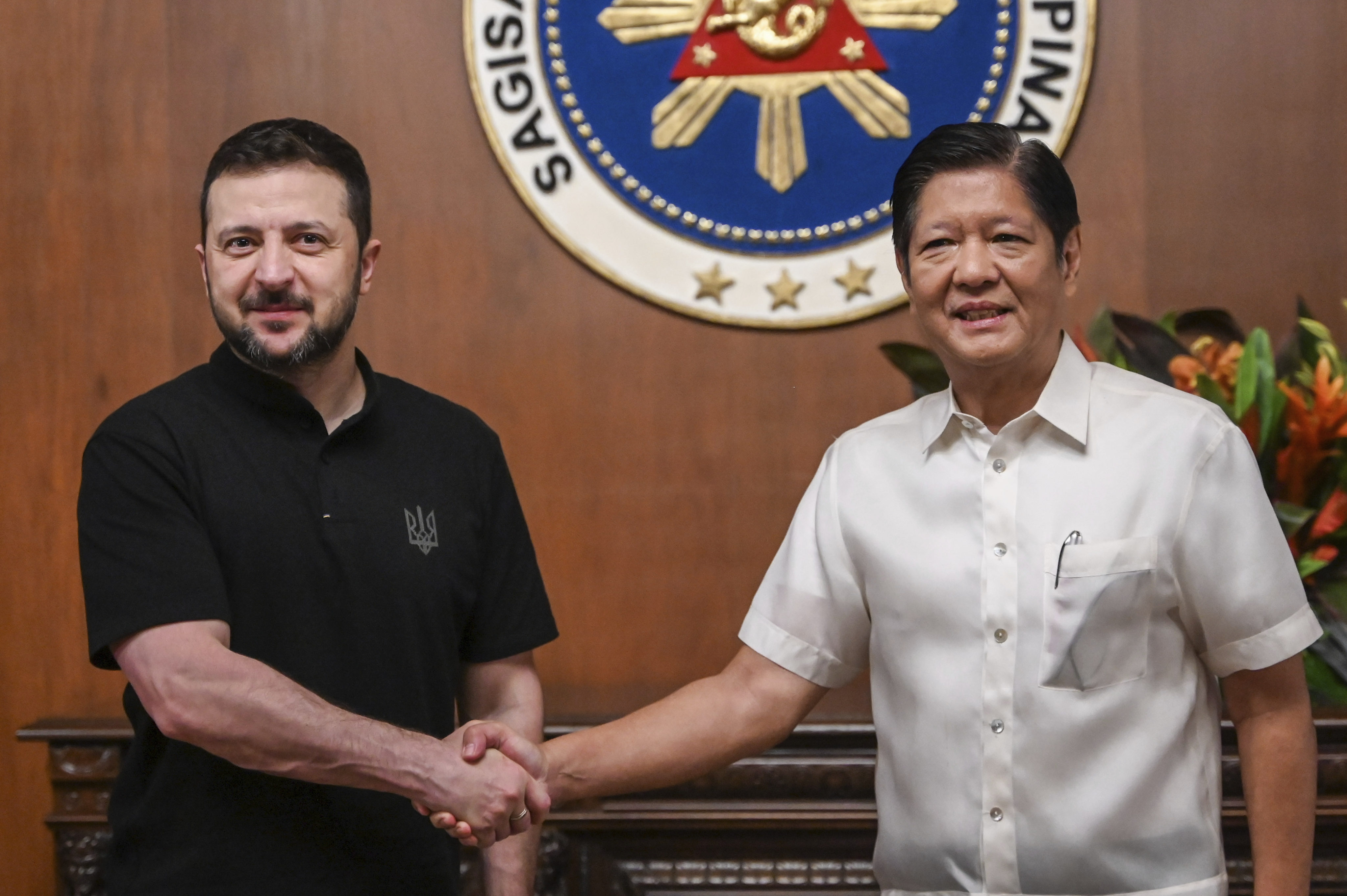 Ukraine’s President Volodymyr Zelensky (left) meets Philippine President Ferdinand Marcos Jnr at the Malacanang presidential palace in Manila on Monday. Photo: Pool via AP