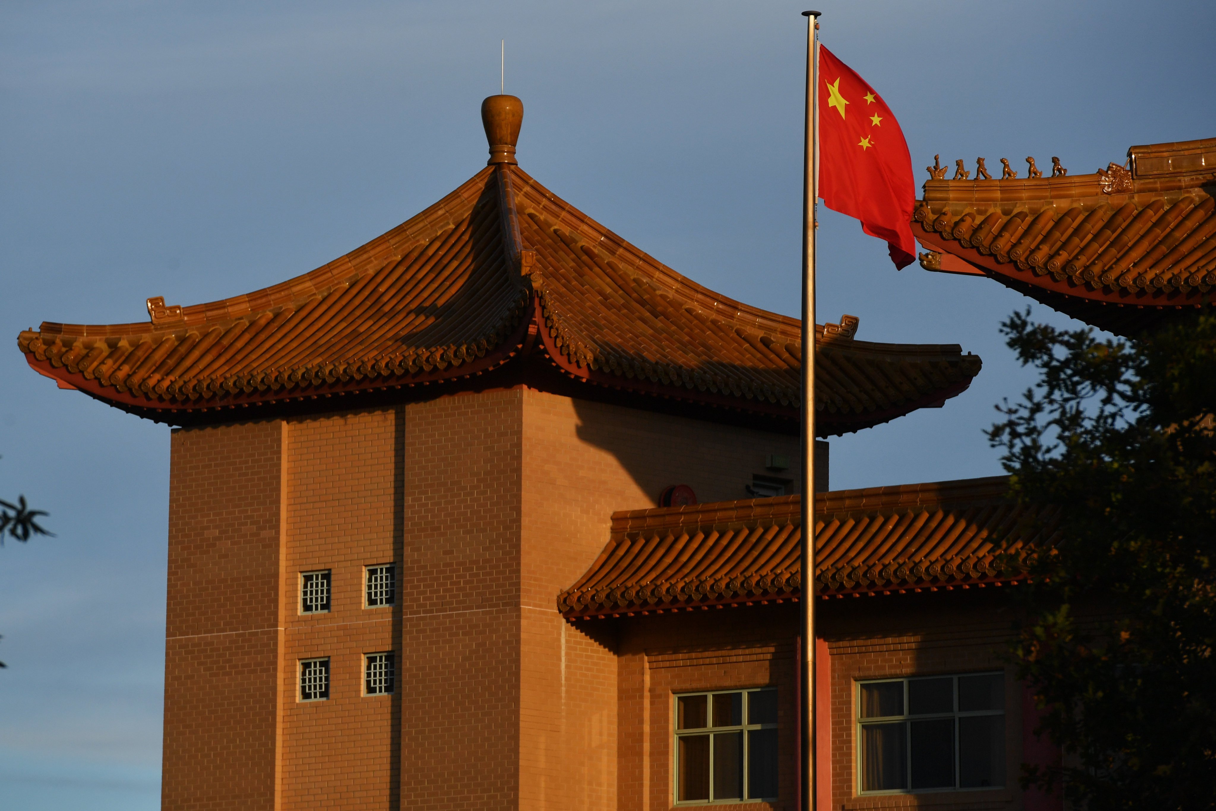 A Chinese flag flies at the embassy of the People’s Republic of China in Canberra, Australia. Photo: Getty Images
