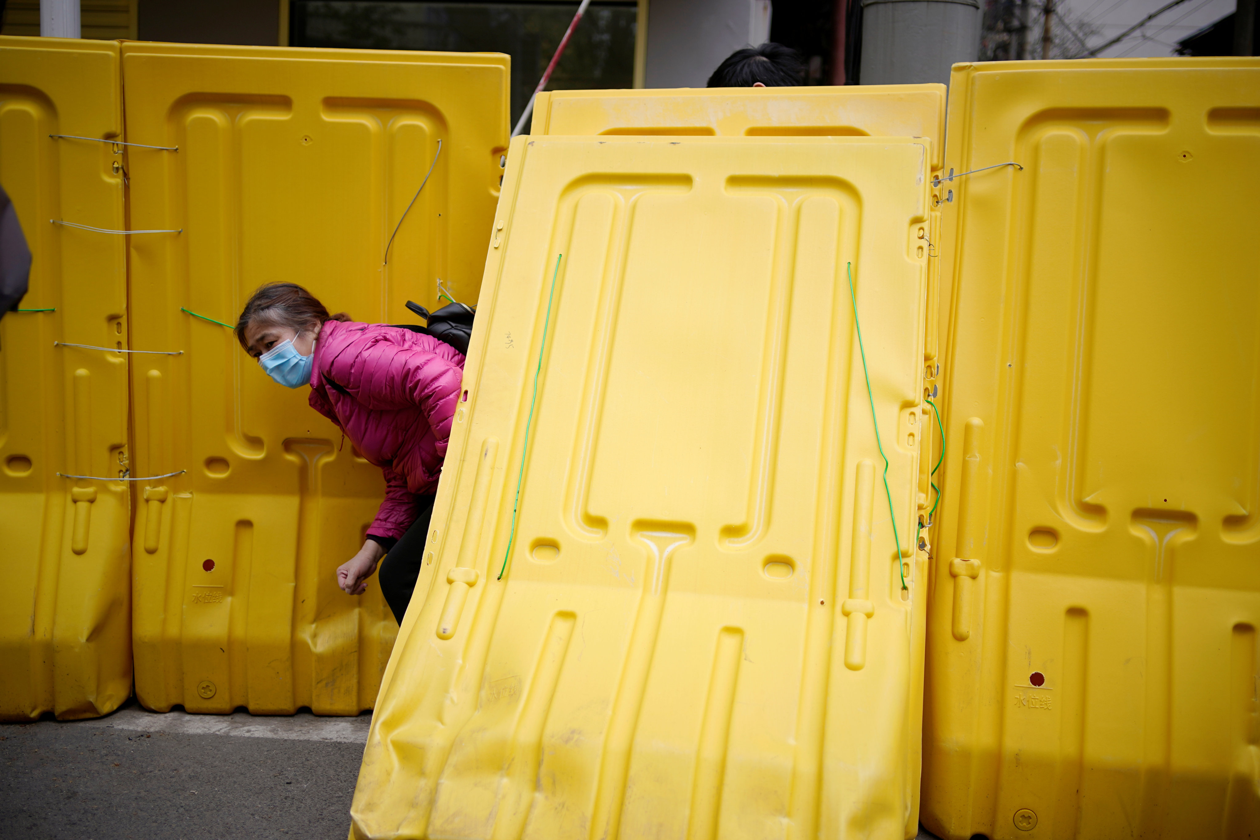 Barriers blocking access to buildings were a feature of Wuhan’s 2020 lockdown, which won widespread public support, a study has found. Photo: Reuters