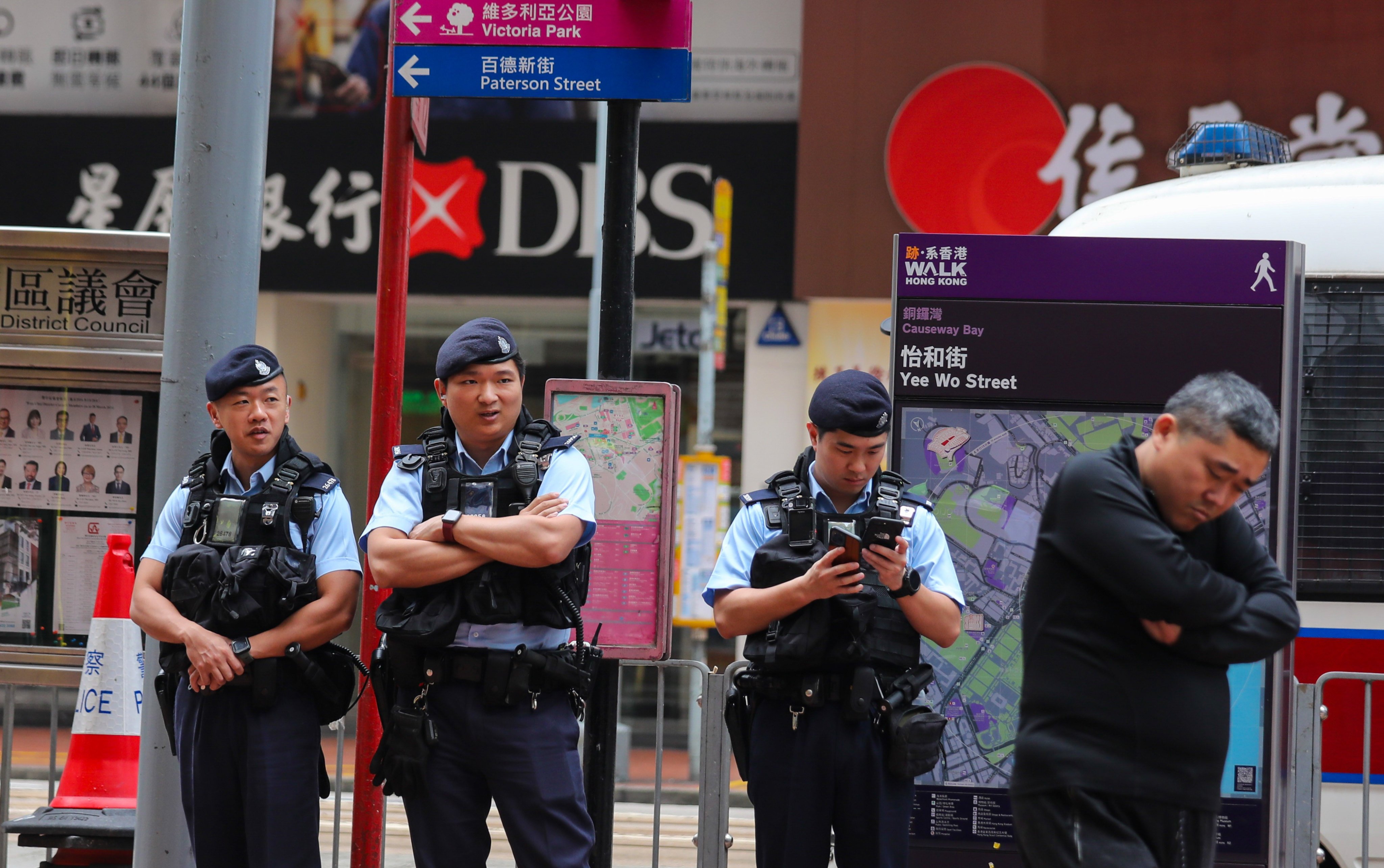 Police officers stage a show of force in the area around Causeway Bay’s Victoria Park, the traditional venue for the commemoration of the Tiananmen Square crackdown. Photo: Xiaomei Chen