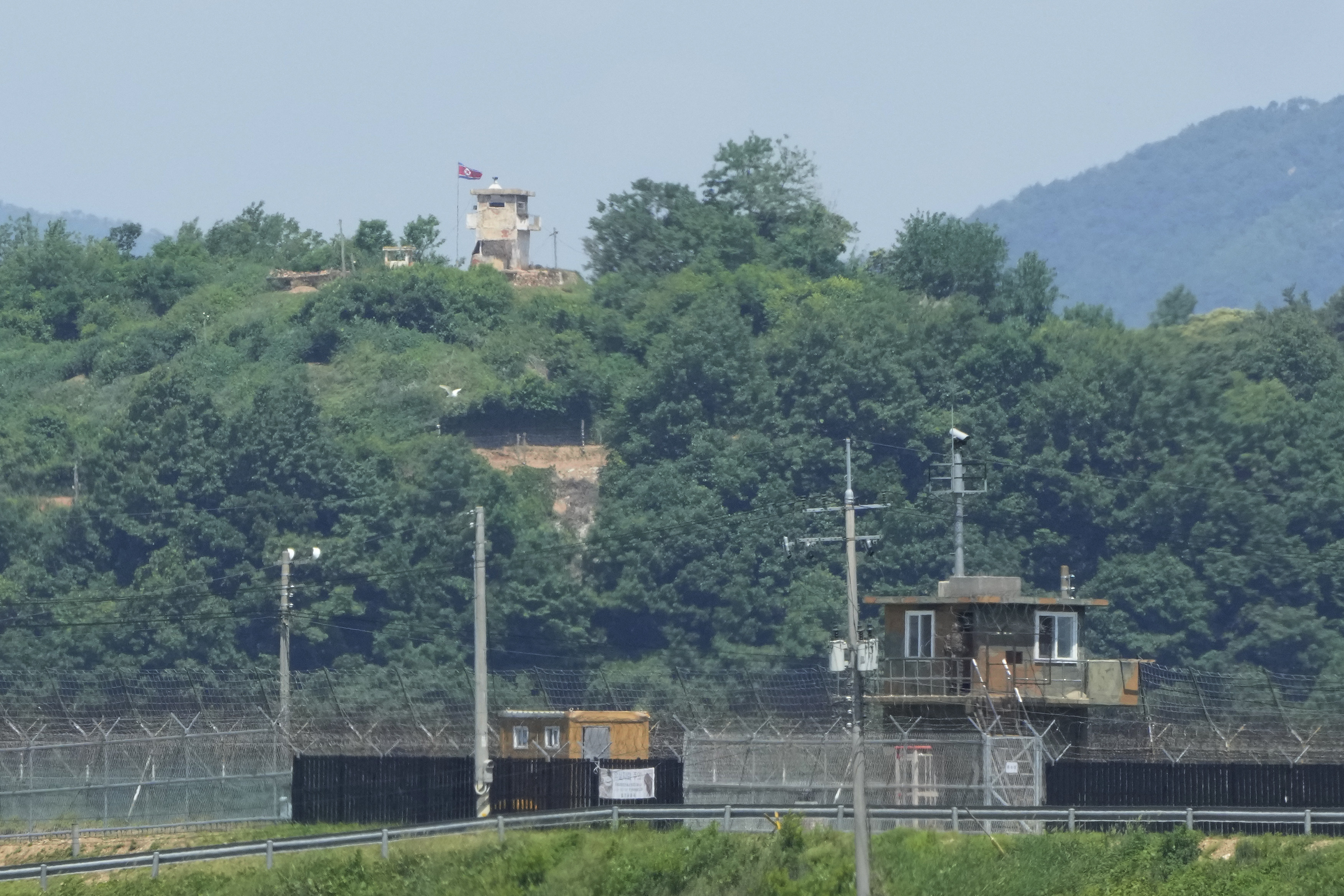 A North Korean military guard post (top) and South Korean post (bottom) are seen from Paju, South Korea, near the border with North Korea, on May 31. Photo: AP