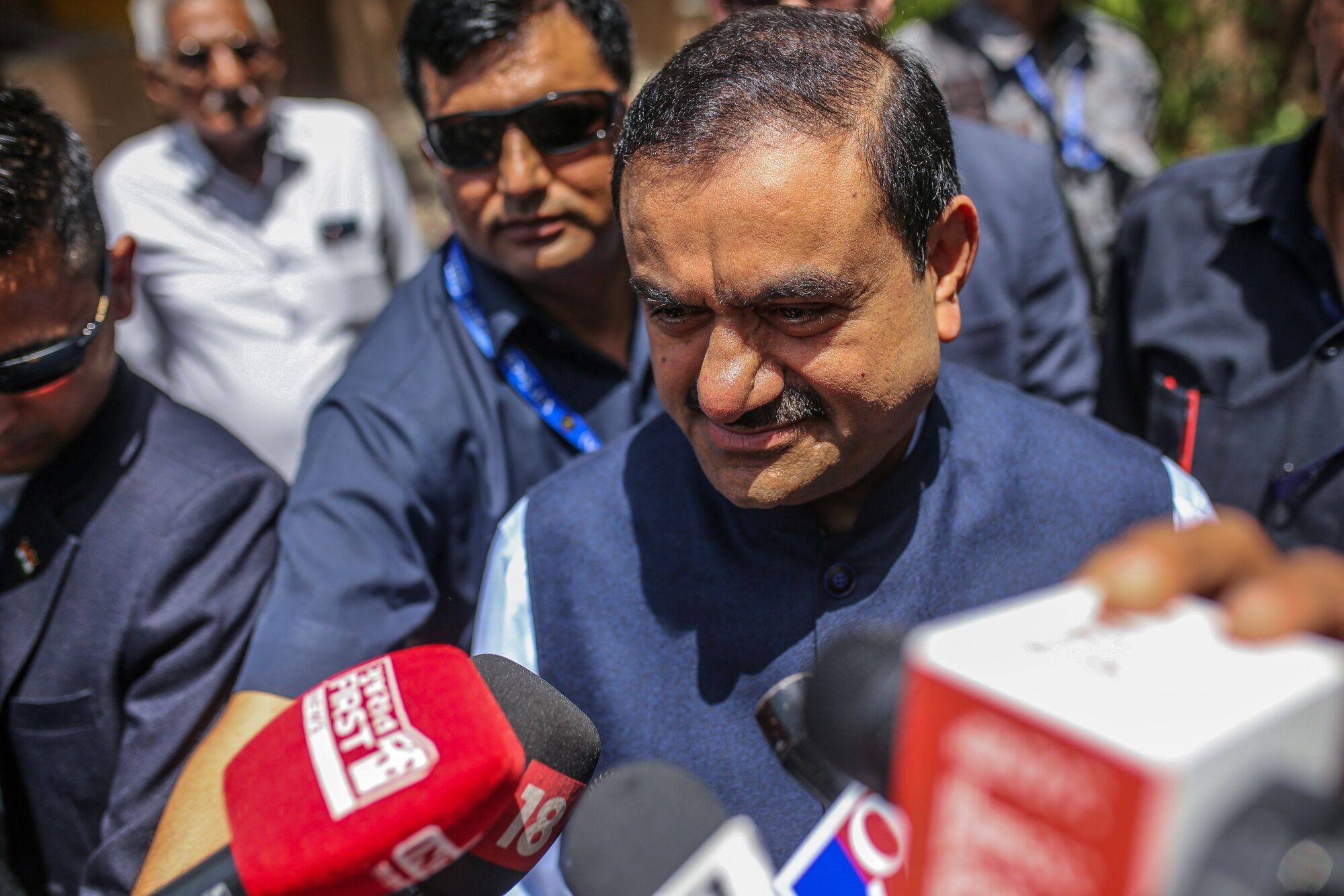 Gautam Adani, chairman of Adani Group, makes his way to a polling station in Ahmedabad, Gujarat, last month. Photo: Bloomberg