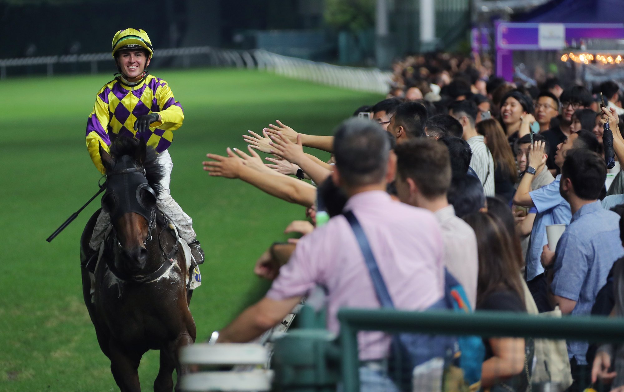 Ben Thompson greets the Happy Valley crowd after booting home Ernest Feeling.