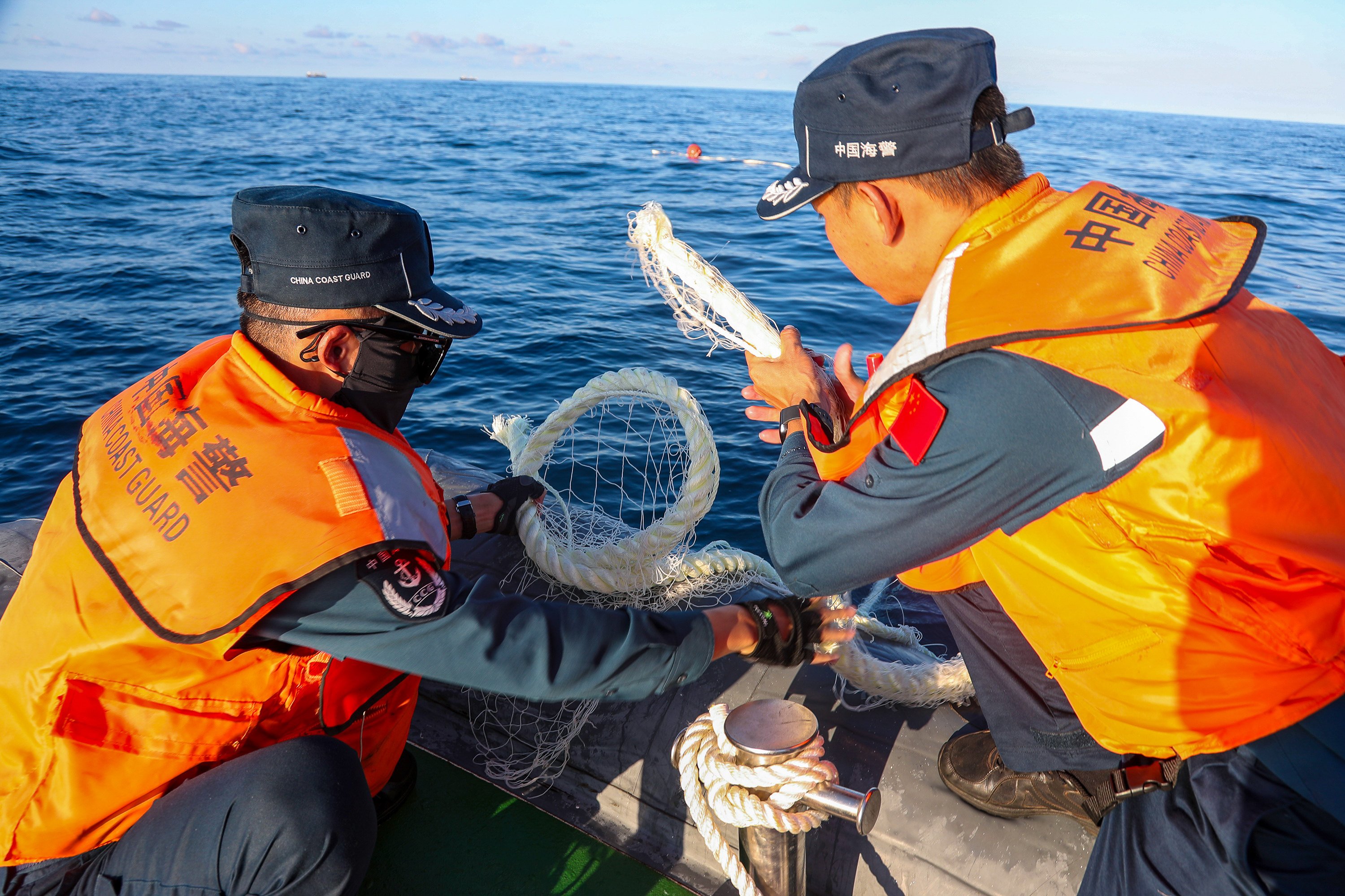 The Chinese coastguard helped fishermen retrieve their damaged nets, according to state media.
Photo: Xinhua