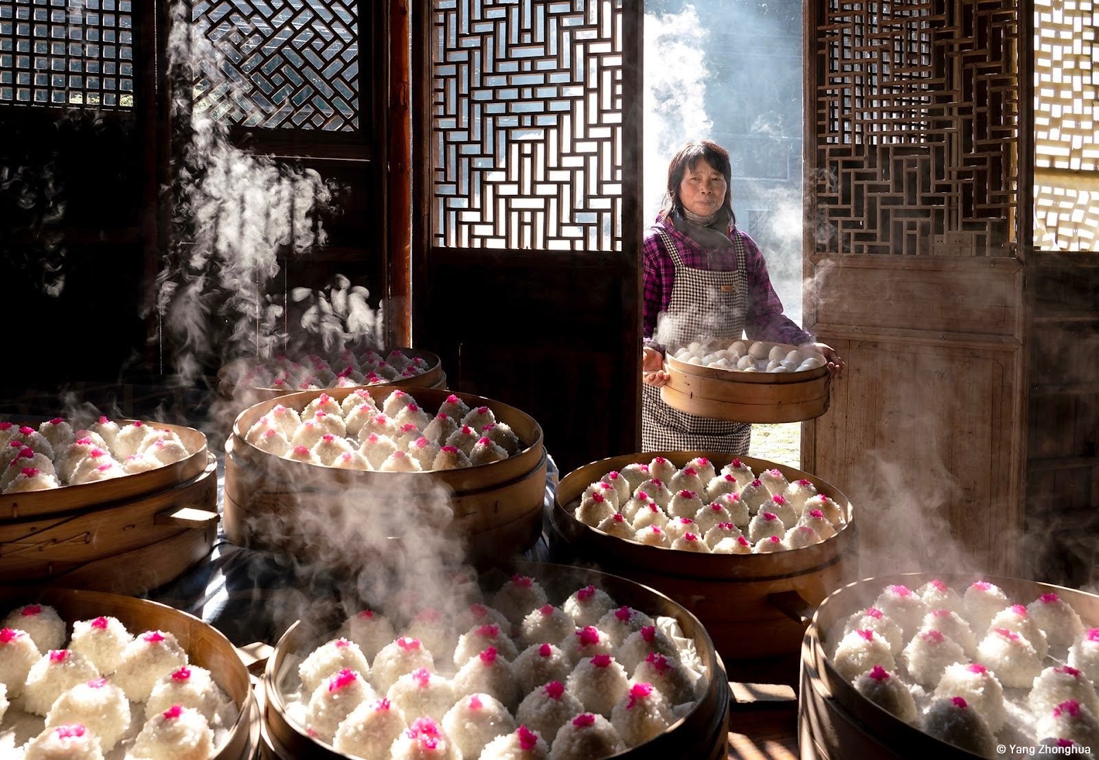 Detail from Zhonghua Yang’s image of a woman preparing steamed dim sum for a Lunar New Year celebration in Xiangshan, Zhejiang province, eastern China which won the overall prize in a global food photography contest. Photo: Zhonghua Yang/Pink Lady