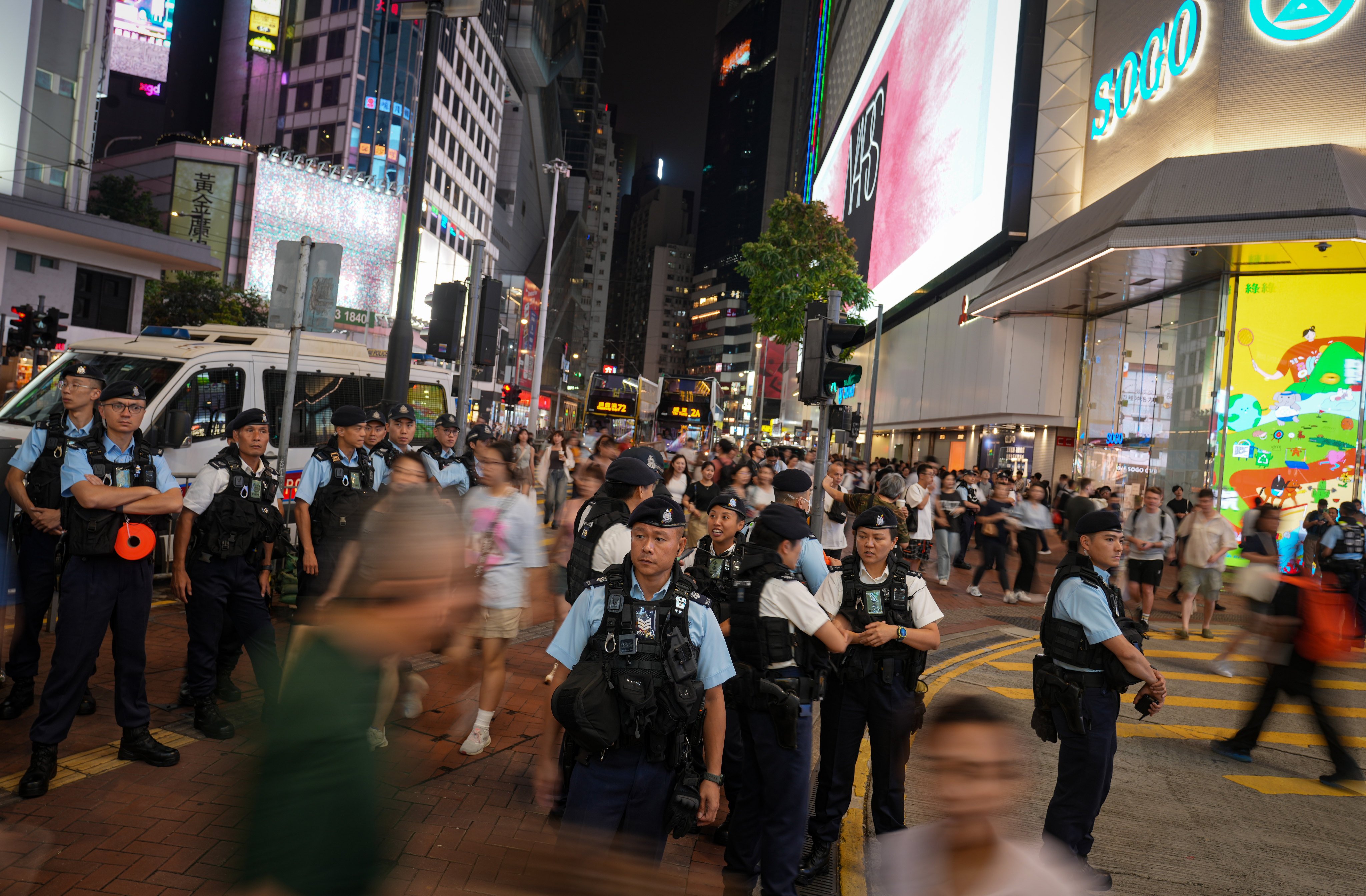 Police officers patrol Causeway Bay on Tuesday. Photo: Sam Tsang