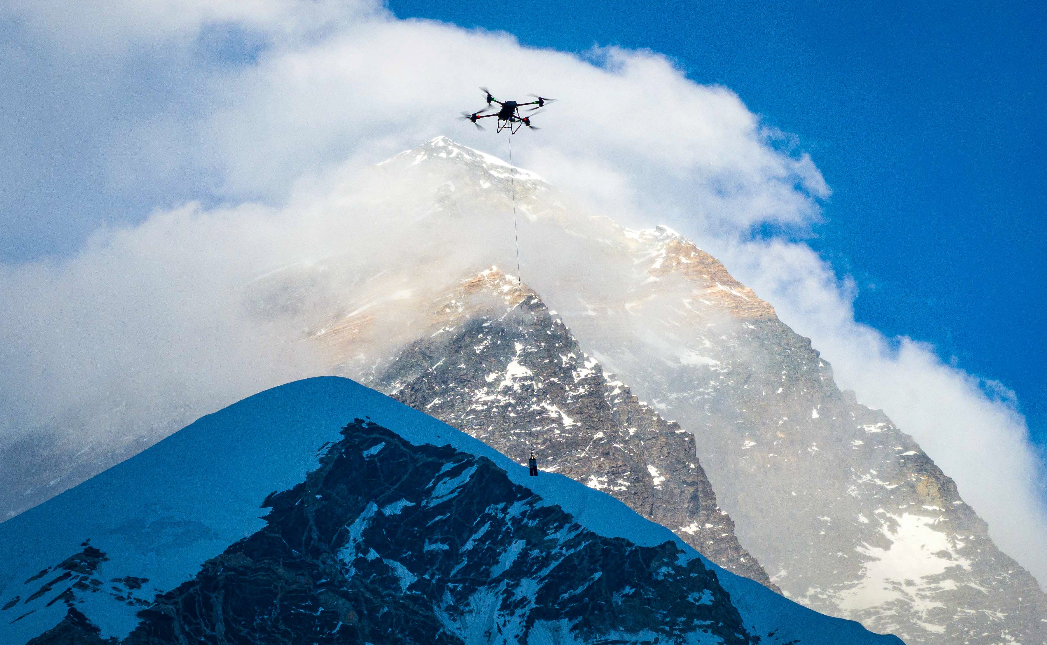 Drones could one day help reduce demands on local Nepalese guides who make treacherous climbs to remove the tonnes of waste discarded by thousands of climbers, and even deliver life-saving supplies to people in distress. Photo: Xinhua