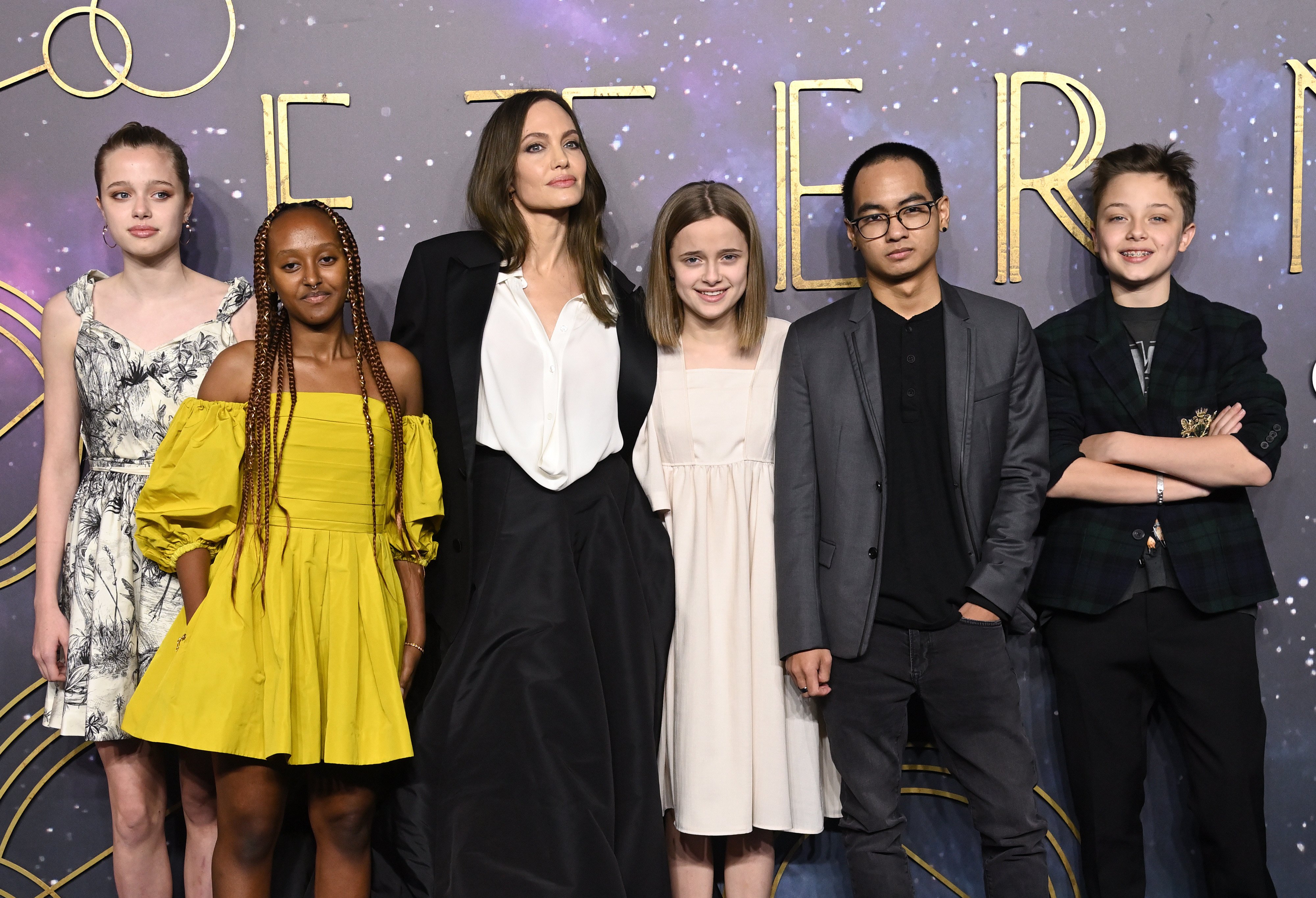 Shiloh Jolie-Pitt, Zahara Jolie-Pitt, Angelina Jolie, Vivienne Jolie-Pitt, Maddox Jolie-Pitt and Knox Jolie-Pitt attend the Eternals UK premiere at BFI Imax Waterloo, in October 2021.