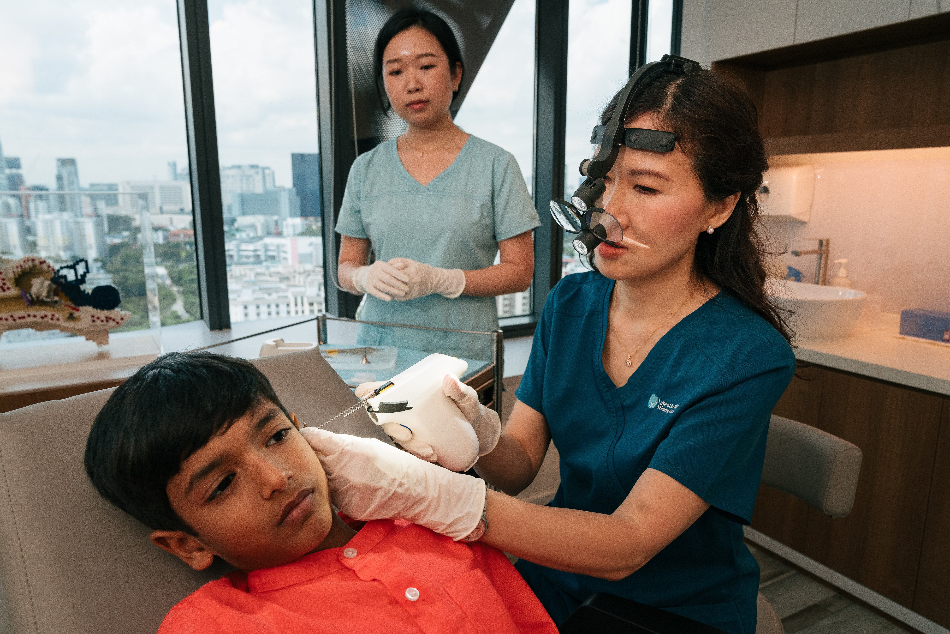 Singaporean doctor Lynne Lim demonstrates the world’s first handheld robotic device for ear tube surgery, which she developed with the National University of Singapore. It has won her a Cartier Women’s Initiative award.  Photo: Cartier