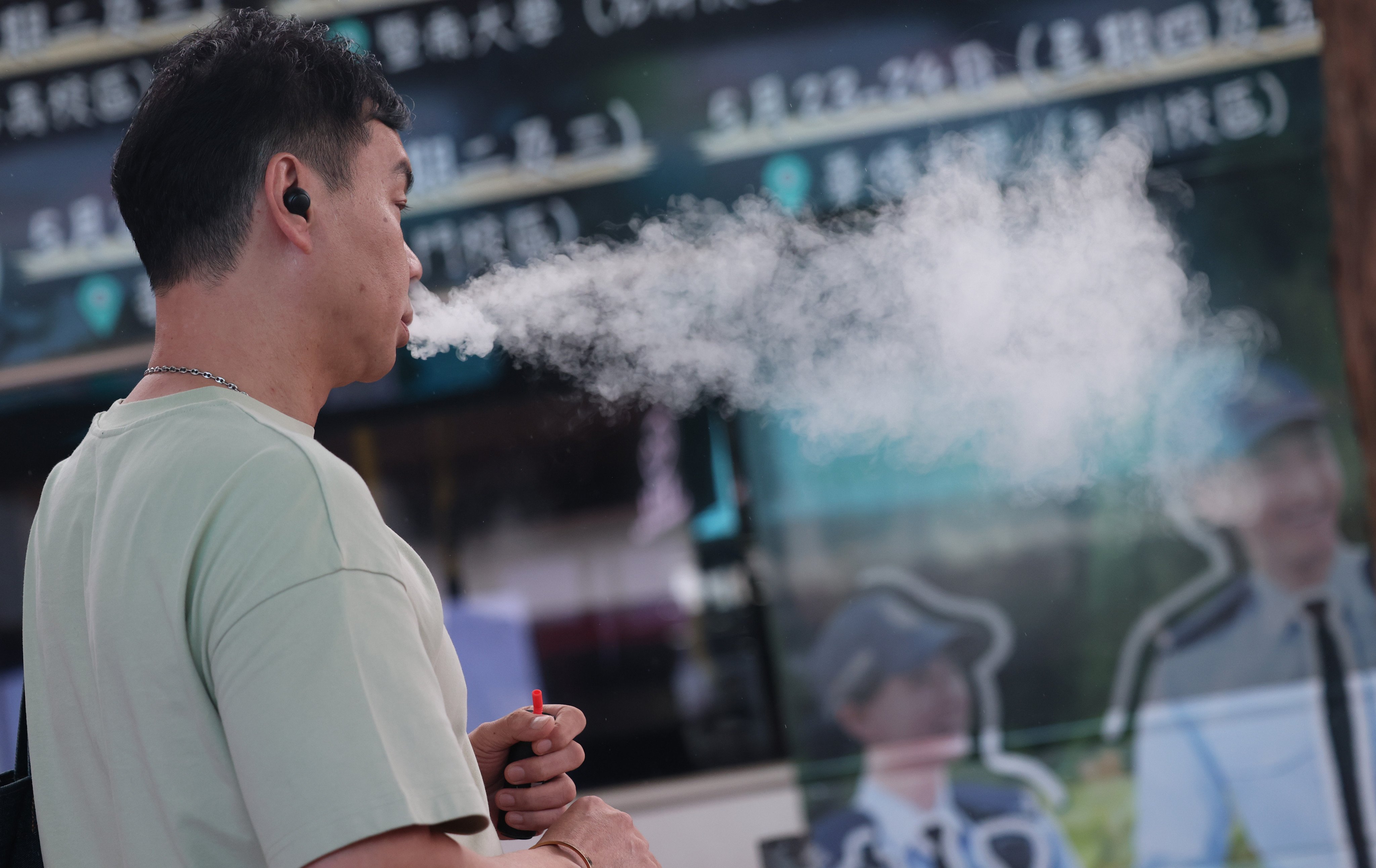 A smoker in Tsim Sha Tsui. The government has announced a range of measures to cut down on the number of tobacco users in the city. Photo: Jelly Tse