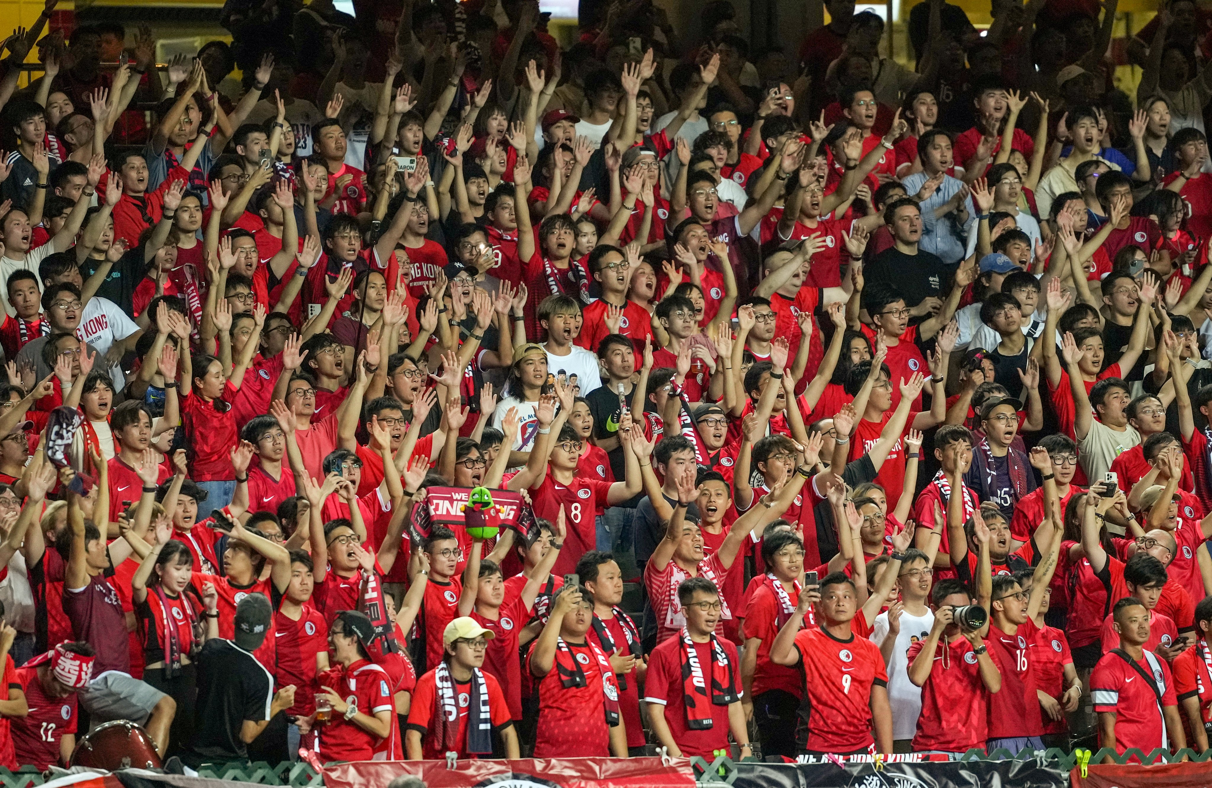 Supporters cheer on the city’s team against Iran at the World Cup qualifier at Hong Kong Stadium. Photo: Sam Tsang