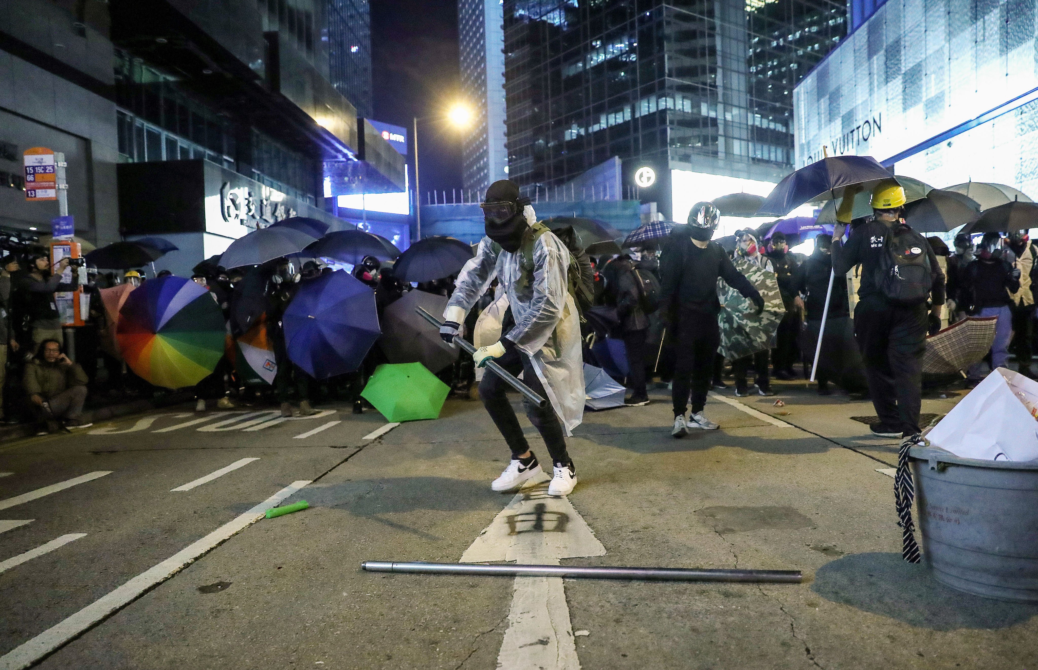 Anti-government protesters barricade a road in Central in 2019. Photo: Sam Tsang