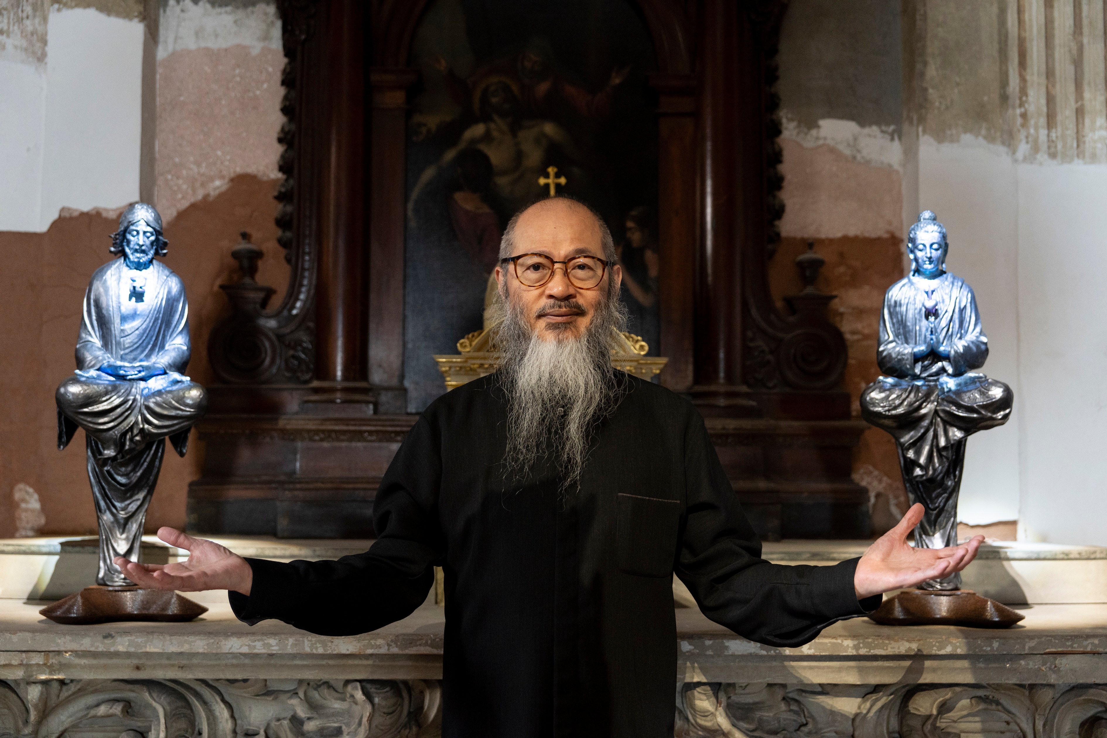 In Wallace Chan’s Transcendence, on show in Venice, suspended sculptures are joined by two smaller ones on an altar: of Jesus and of Buddha, with their heads swapped. Photo: Federico Sutera