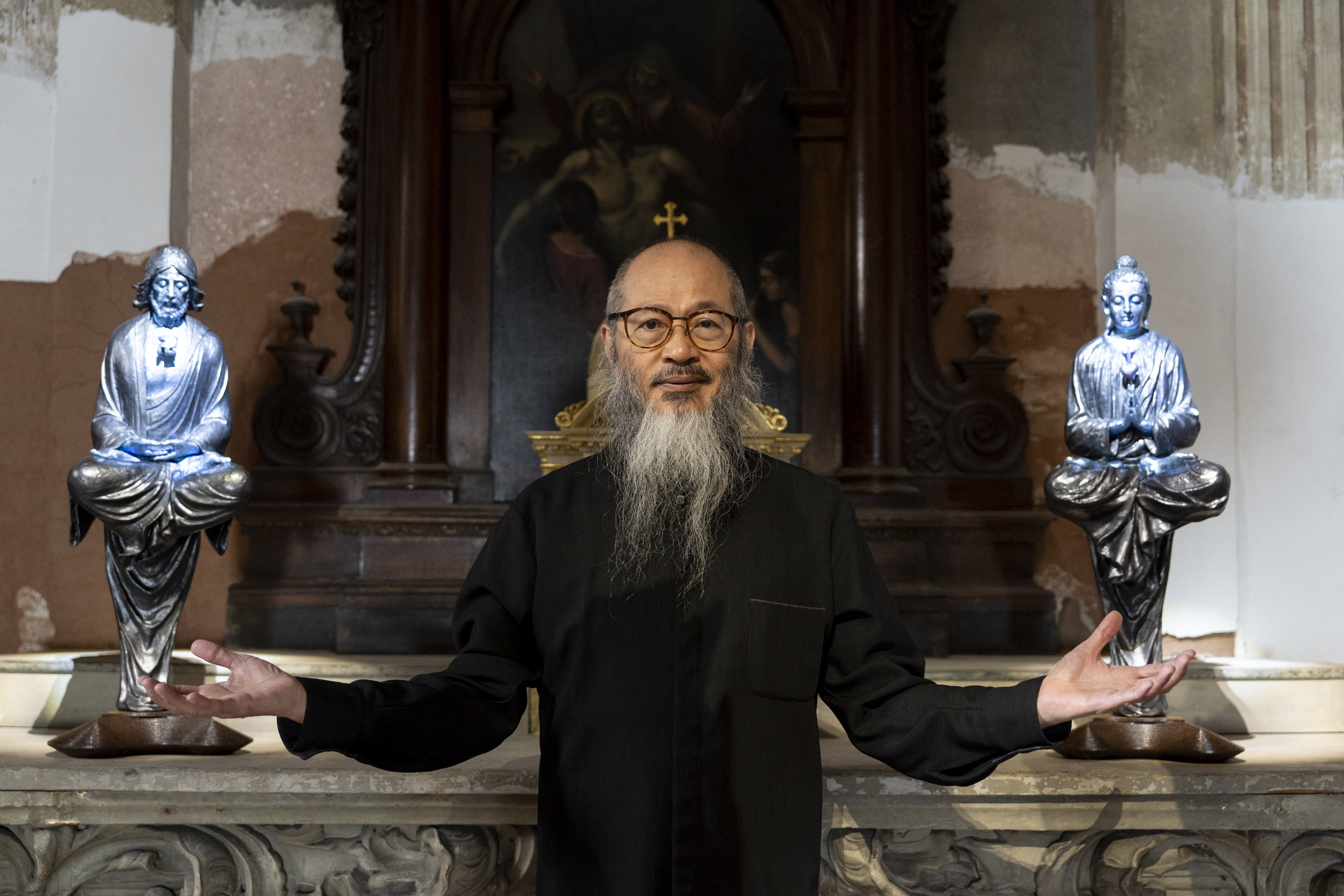 In Wallace Chan’s Transcendence, on show in Venice, suspended sculptures are joined by two smaller ones on an altar: of Jesus and of Buddha, with their heads swapped. Photo: Federico Sutera