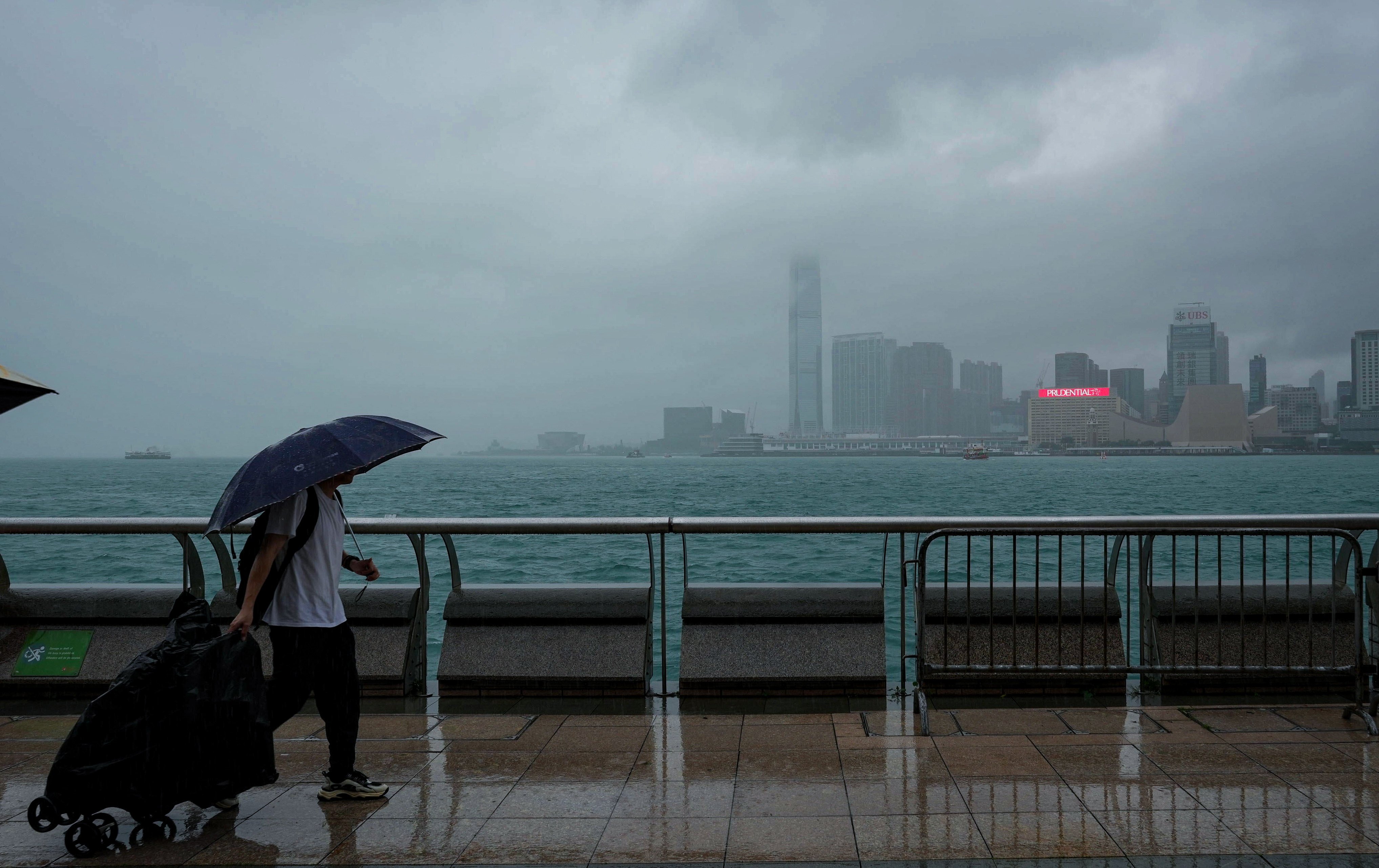 Rainy weather along the waterfront of Victoria Harbour in Wan Chai. Photo: May Tse