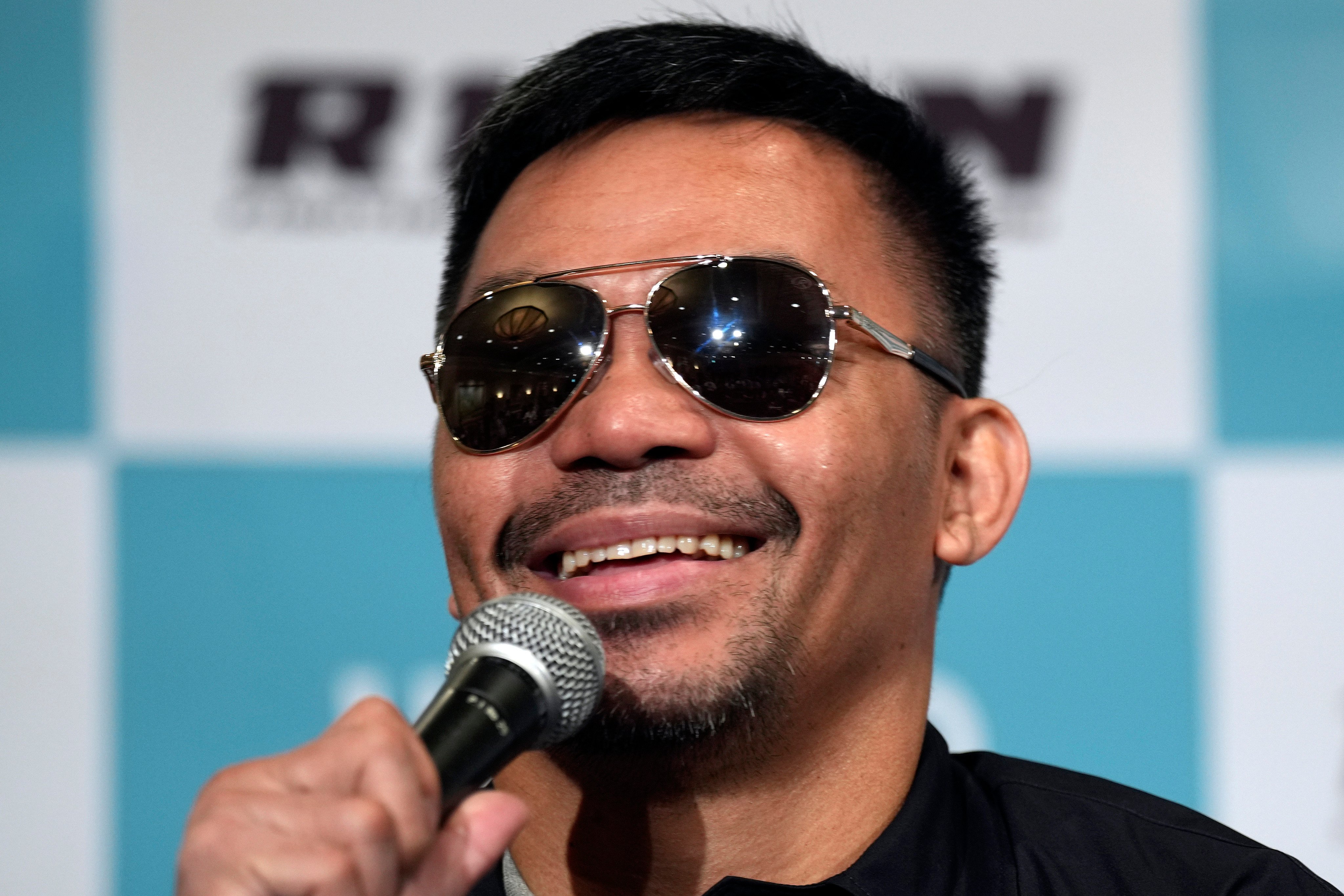 Former Filipino boxer Manny Pacquiao saus he is in early talks to face the American Mario Barrios for the WBC welterweight world title. Photo: AP