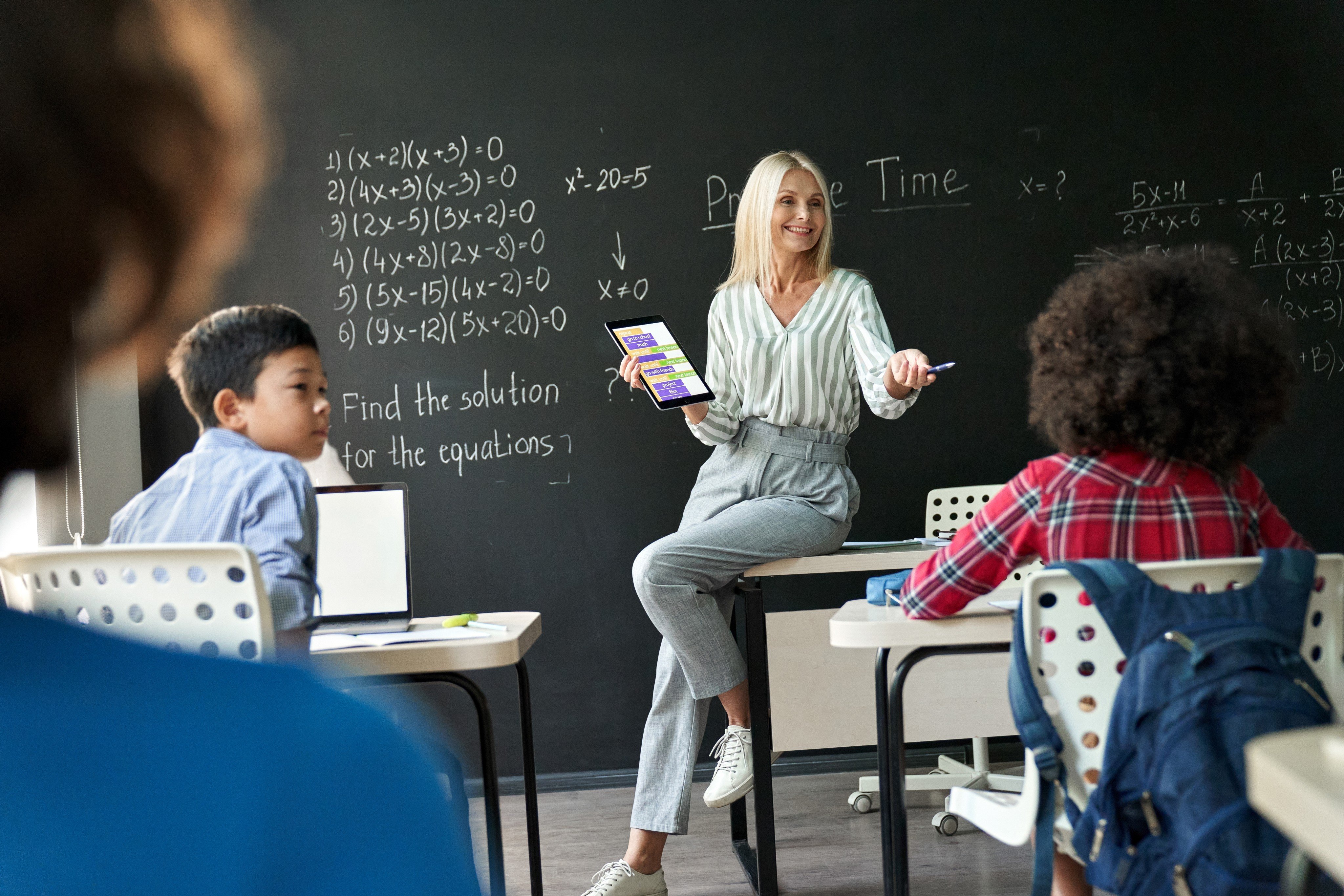 Having a mentally stimulating job, such as being a teacher (above), in midlife may help build cognitive reserve which protects you against dementia as you age. Photo: Shutterstock