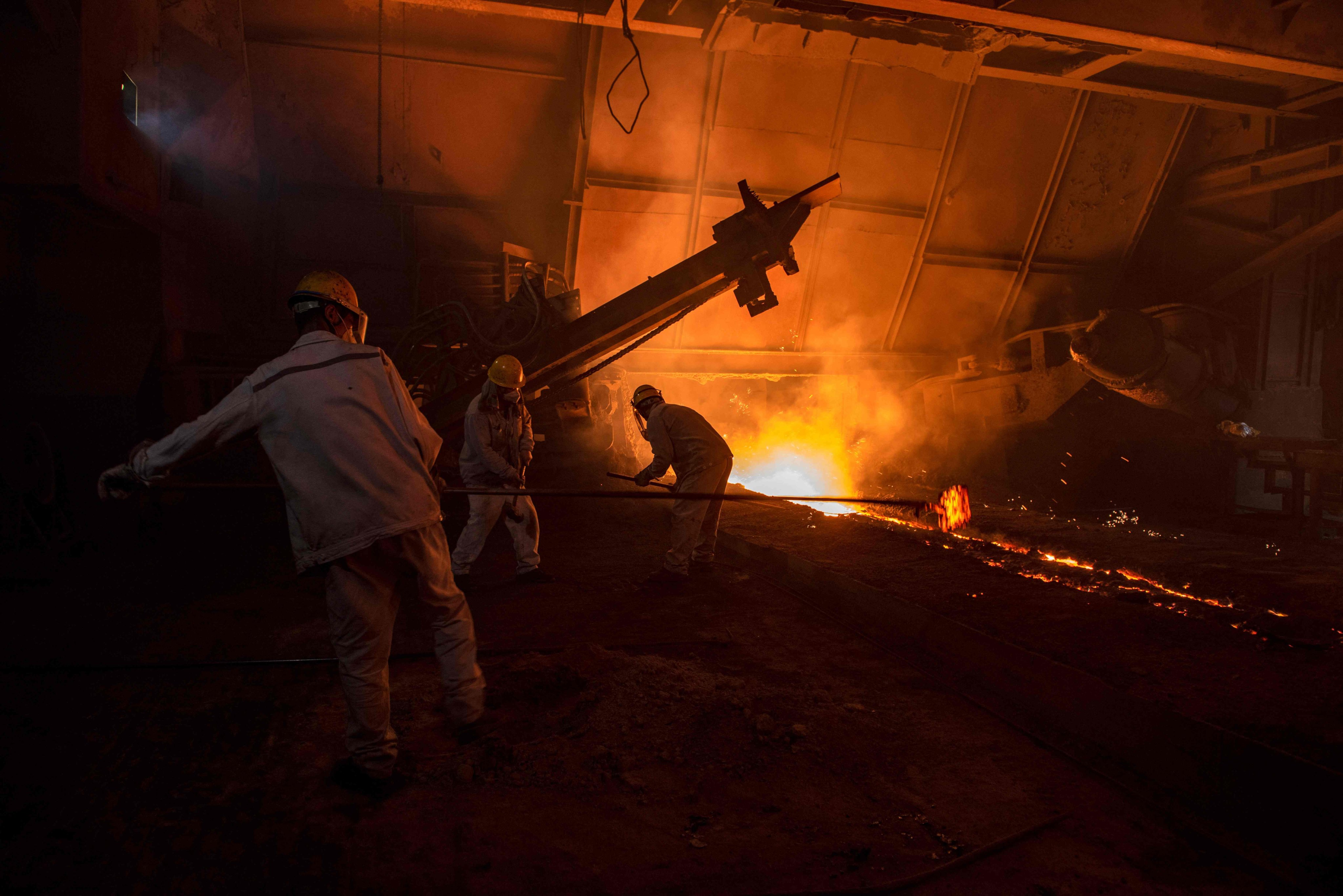 Workers in a steel factory in Huai’an, in China’s eastern Jiangsu province on September 23, 2023. Photo: AFP