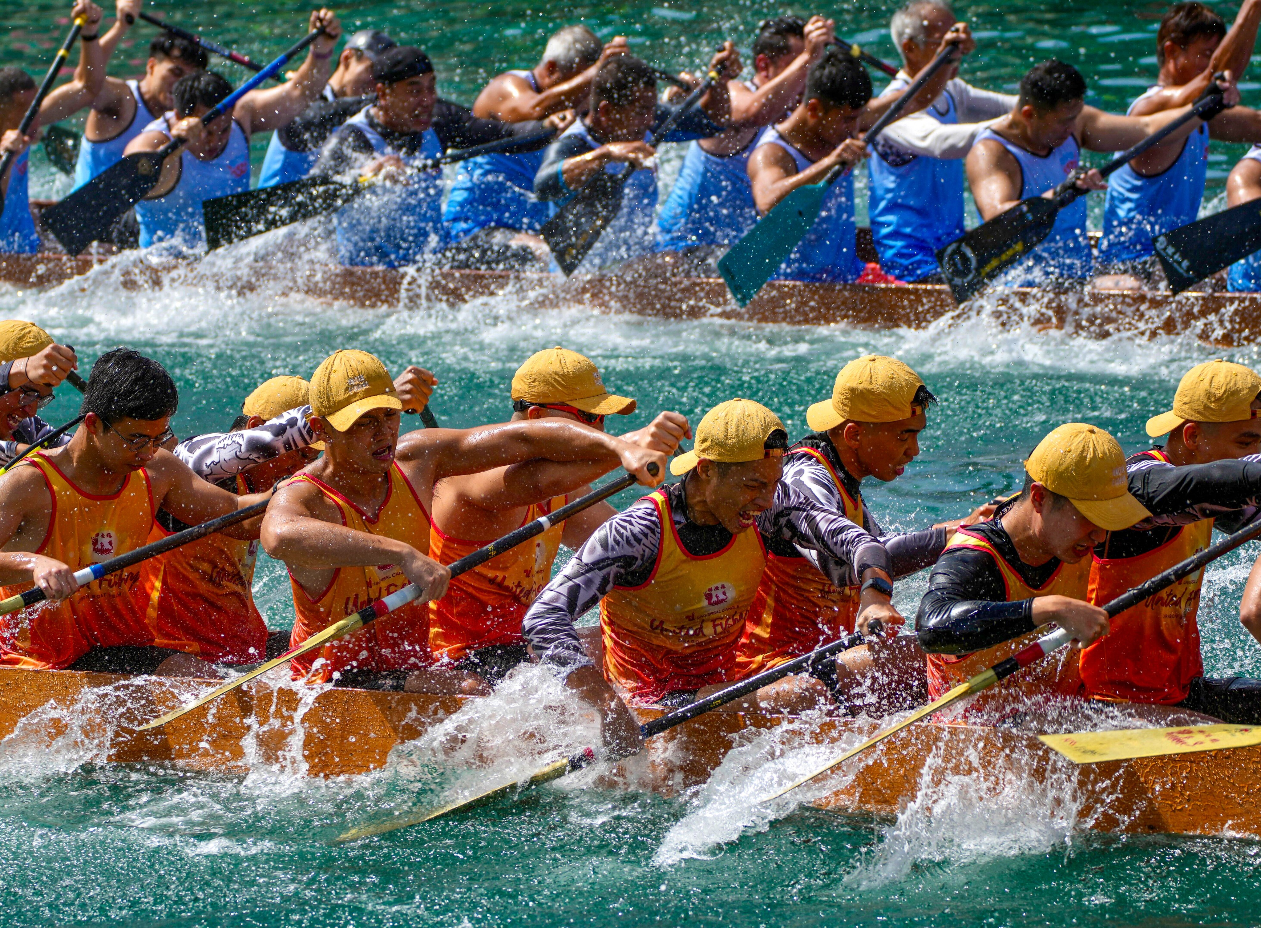 Contestants battle it out during the festival’s dragon boat races. Photo: Sam Tsang