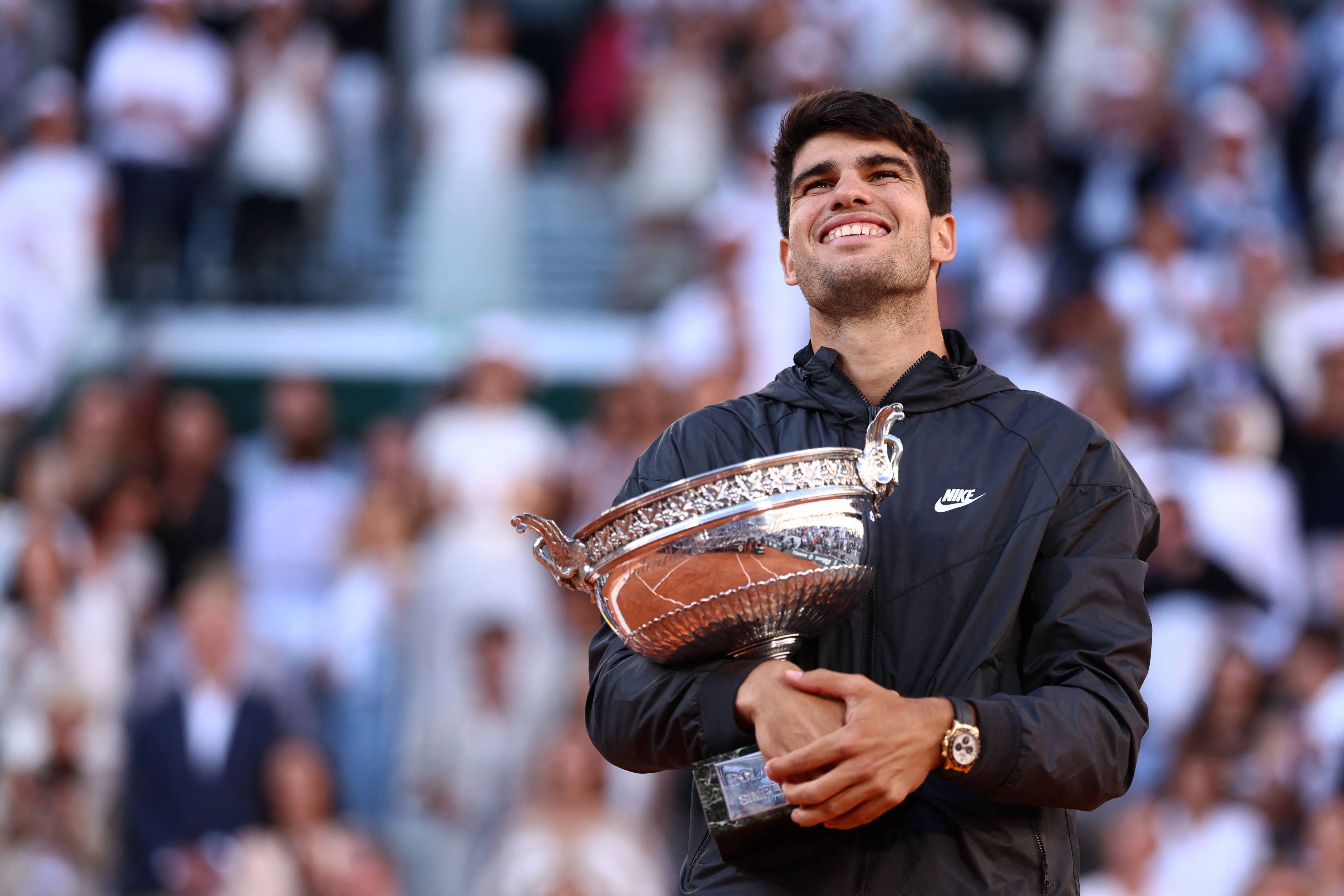 Carlos Alcaraz is all smiles after beating Alexander Zverev to become the French Open champion. Photo: AFP