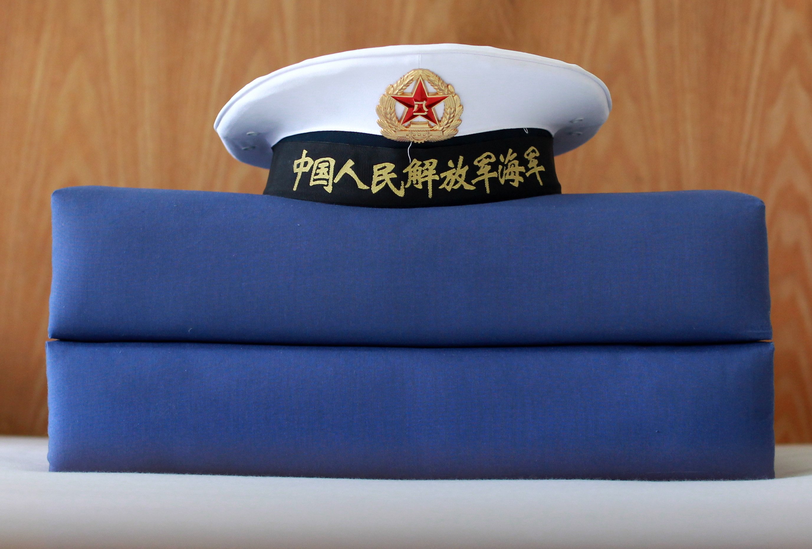 Official PLA uniforms. The uniforms found in the Pogo raid were likely props, a Philippine military official said. Photo: May Tse