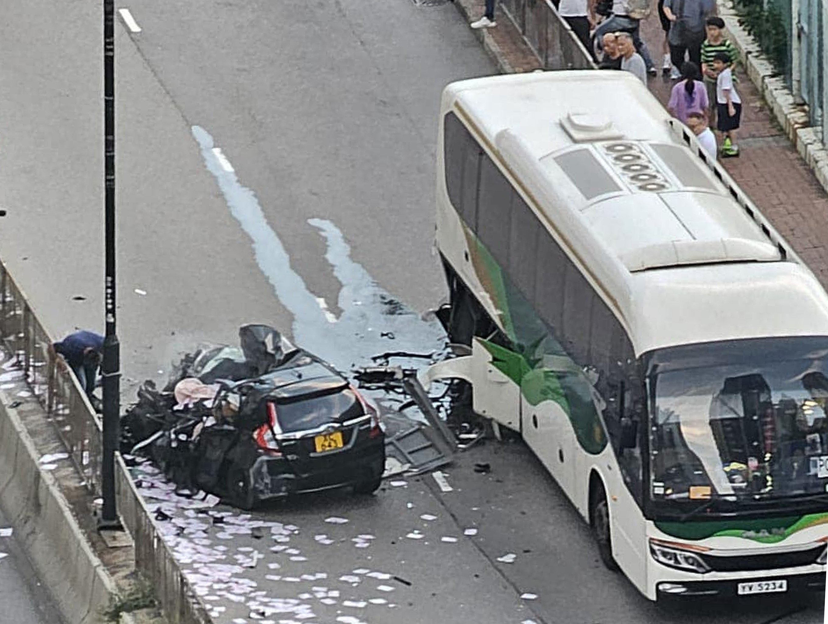 The wreckage of a car after it and a tour bus were in collision near Kwai Chung Sports Ground. Photo: Handout